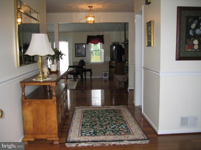 15006 Rolling Ridge Road Haymarket, VA 20169 - Photo 2 of 22 Foyer Entry with Gorgeous Brazillian Cherry Floors