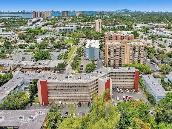 a view of building with yard