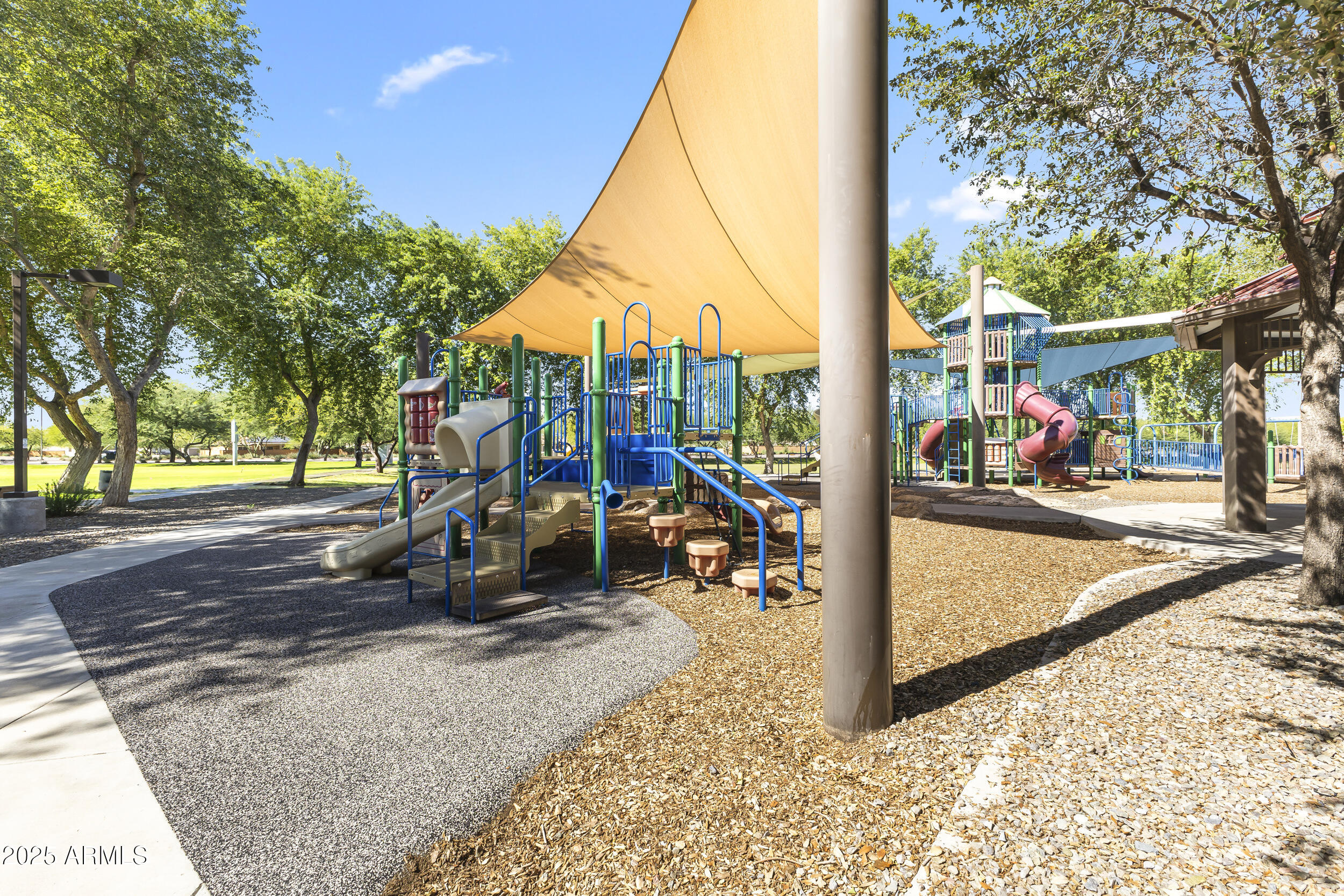 25915 West Quail Avenue Buckeye, AZ 85396 - Photo 59 of 73 a view of a park with large trees
