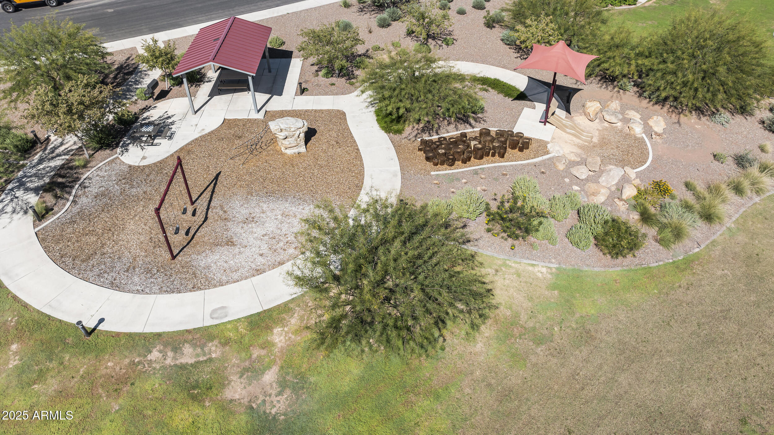 25915 West Quail Avenue Buckeye, AZ 85396 - Photo 69 of 73 a view of a swimming pool with a yard