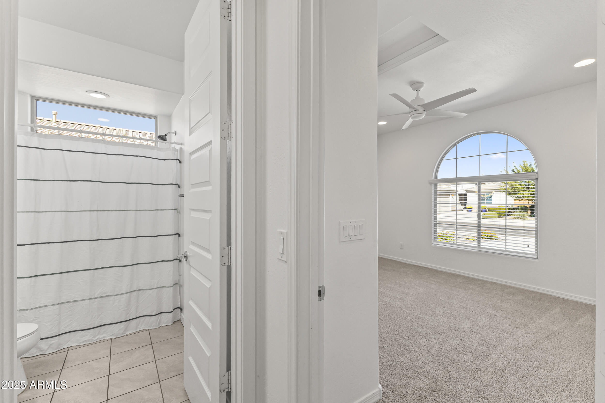 25915 West Quail Avenue Buckeye, AZ 85396 - Photo 9 of 73 a view of an empty room with a window