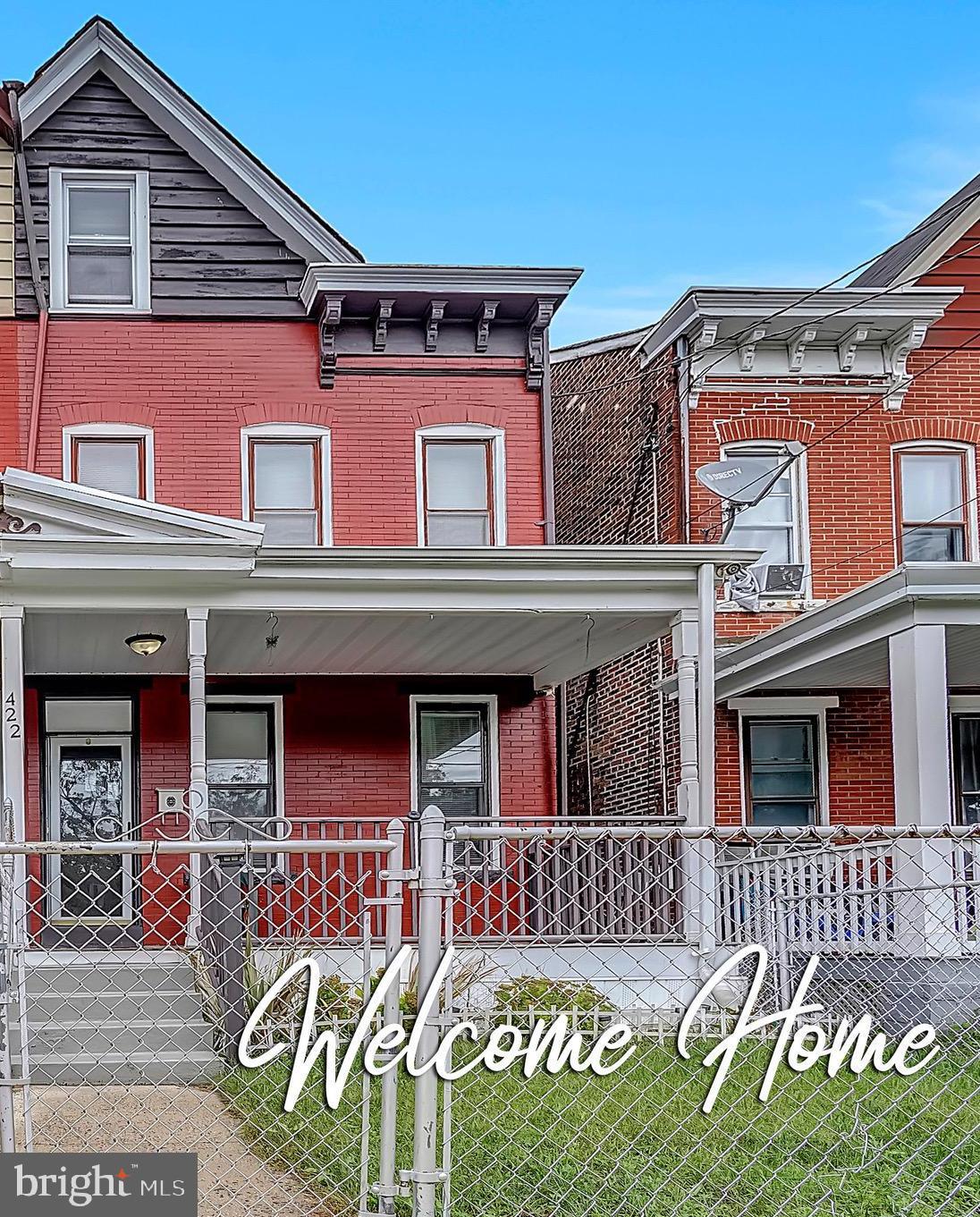 422 Rutherford Avenue Trenton, NJ 08618 - Photo 1 of 19 a front view of a house with entryway