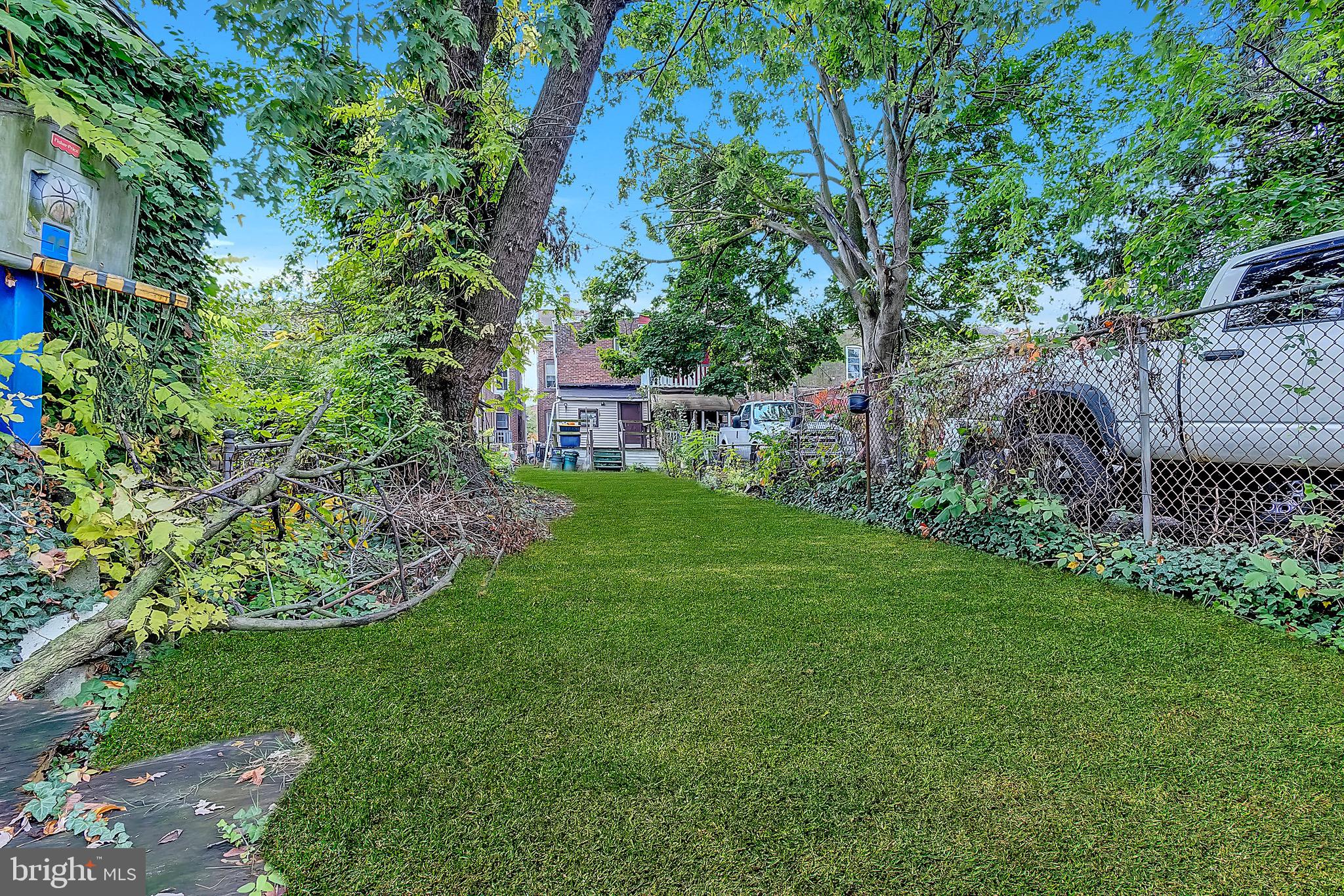 422 Rutherford Avenue Trenton, NJ 08618 - Photo 18 of 19 a view of a backyard with a garden