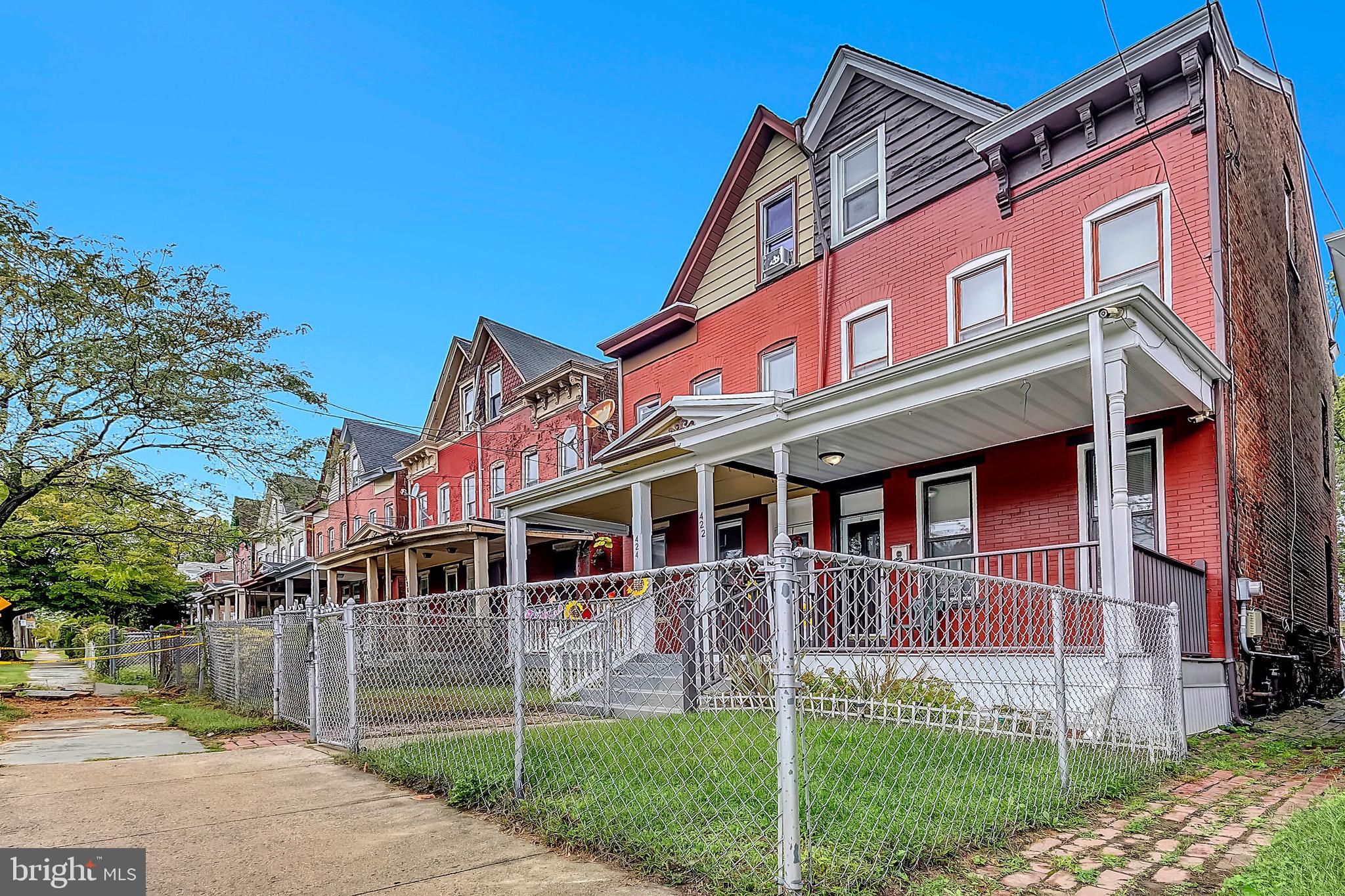 422 Rutherford Avenue Trenton, NJ 08618 - Photo 3 of 19 a view of a house with a yard and plants