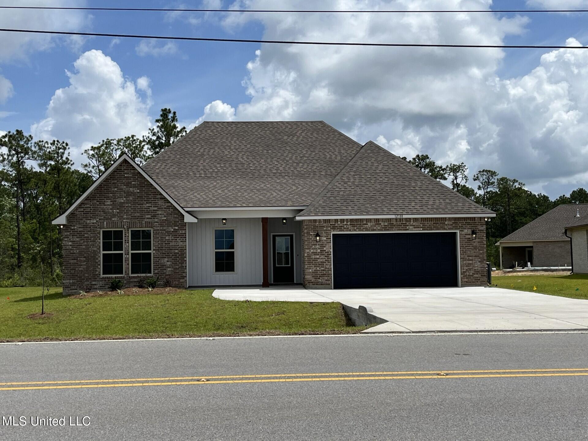 12188 Walker Road Ocean Springs, MS 39564 - Photo 1 of 3 2SN 52 FRONT