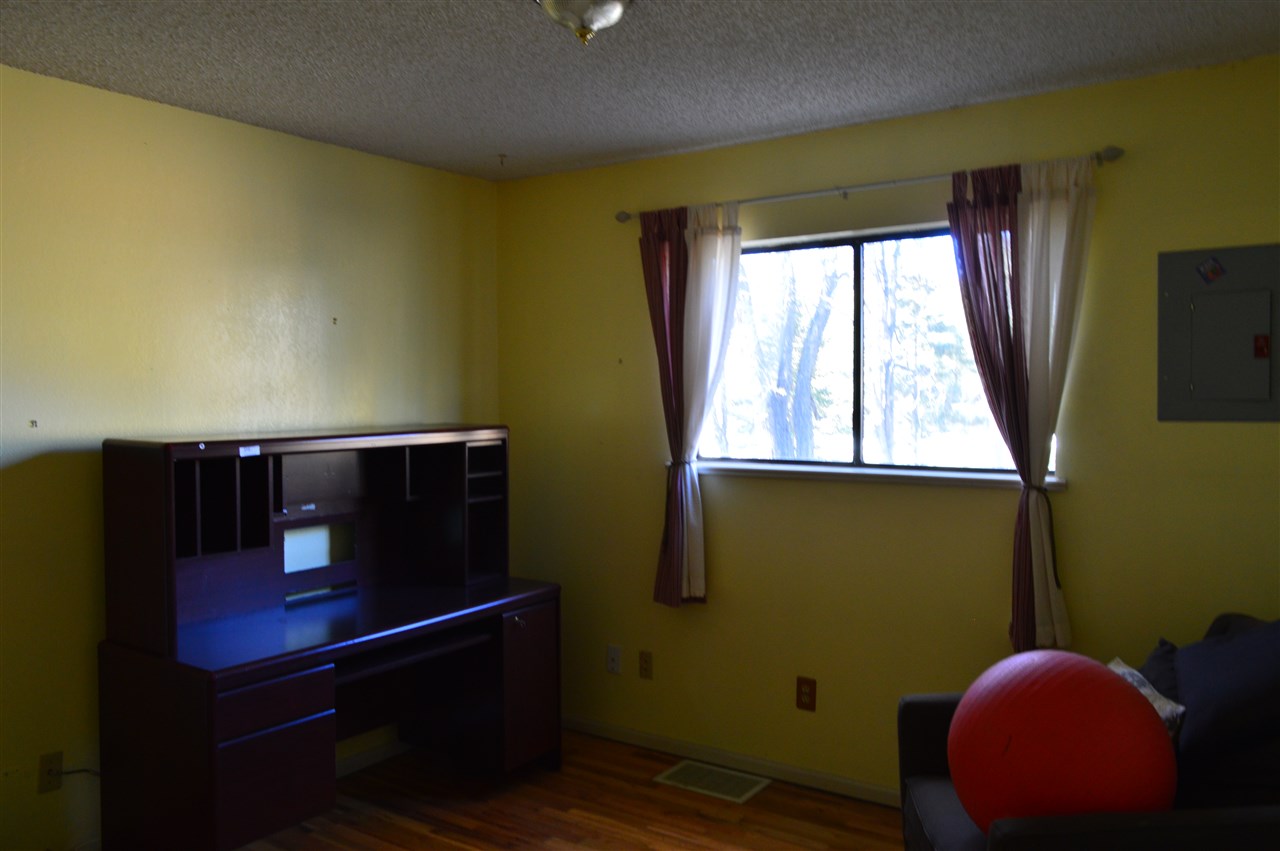 737 25 Road Grand Junction, CO 81505 - Photo 8 of 21 a living room with furniture and a window