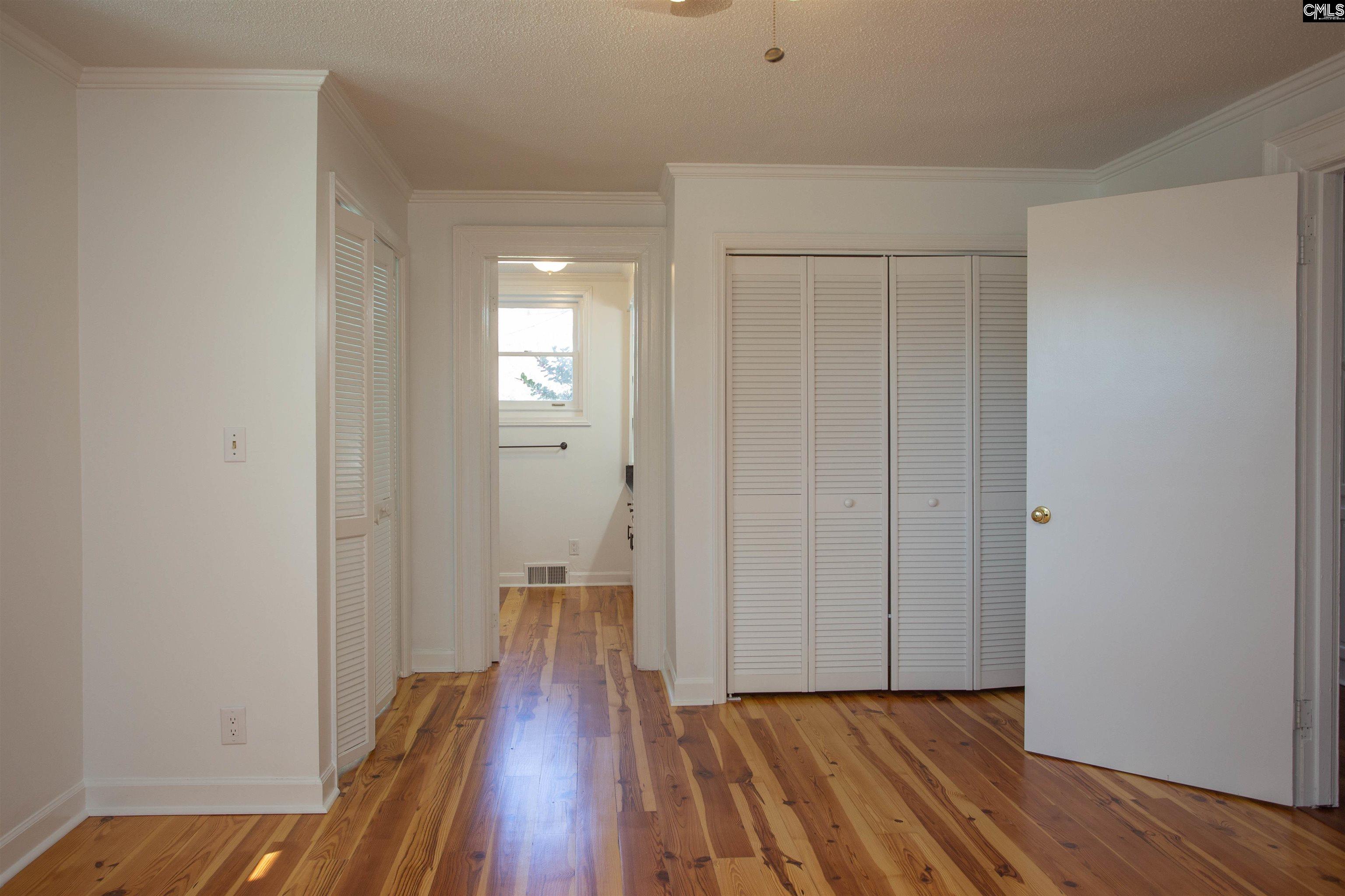 1700 Broad Street Camden, SC 29020 - Photo 17 of 41 a view of a hallway with wooden floor