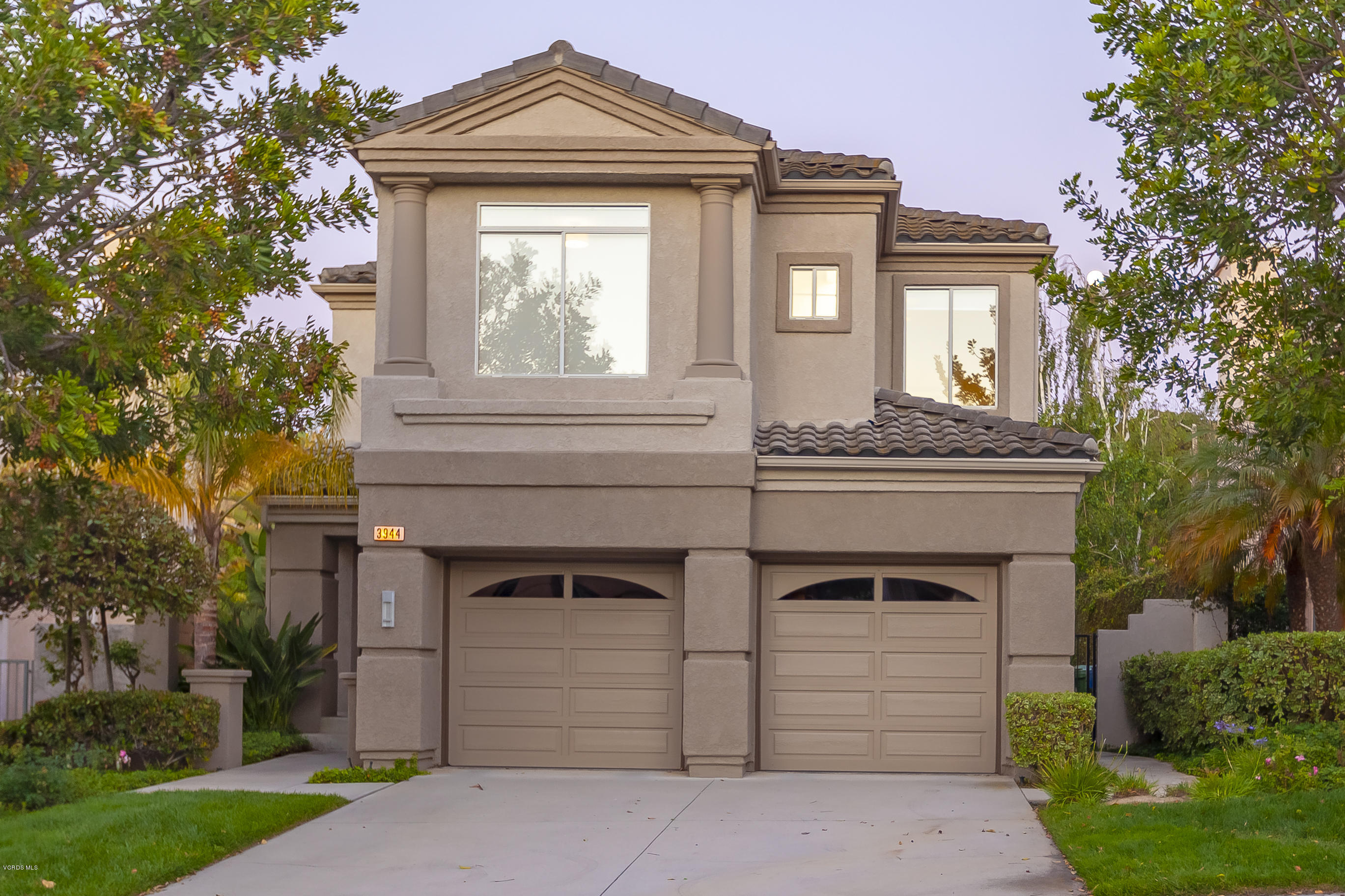3944 Sunsetridge Road Moorpark, CA 93021 - Photo 1 of 25 a front view of a house with a yard