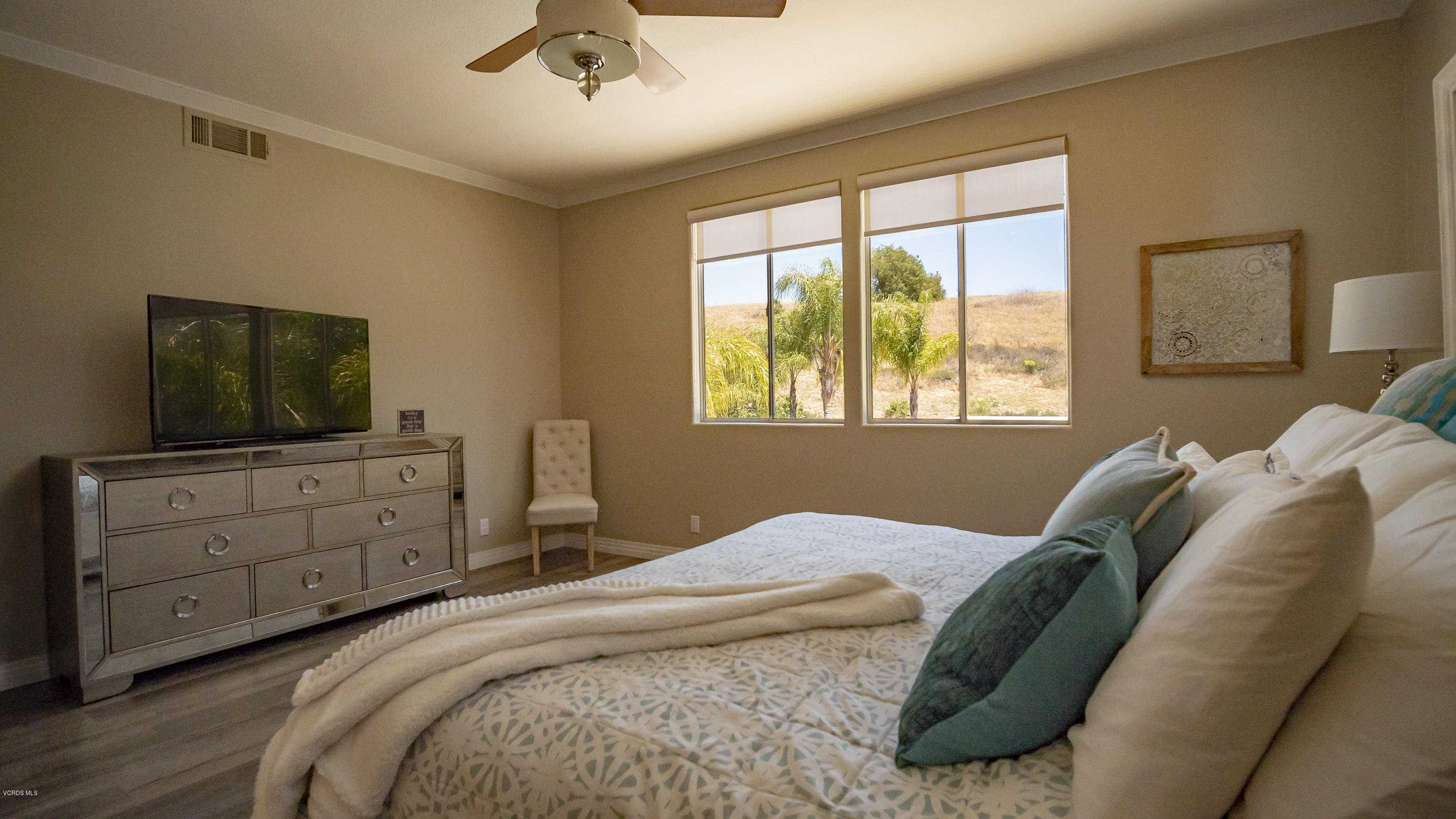 3944 Sunsetridge Road Moorpark, CA 93021 - Photo 17 of 25 a bedroom with a bed and a dresser