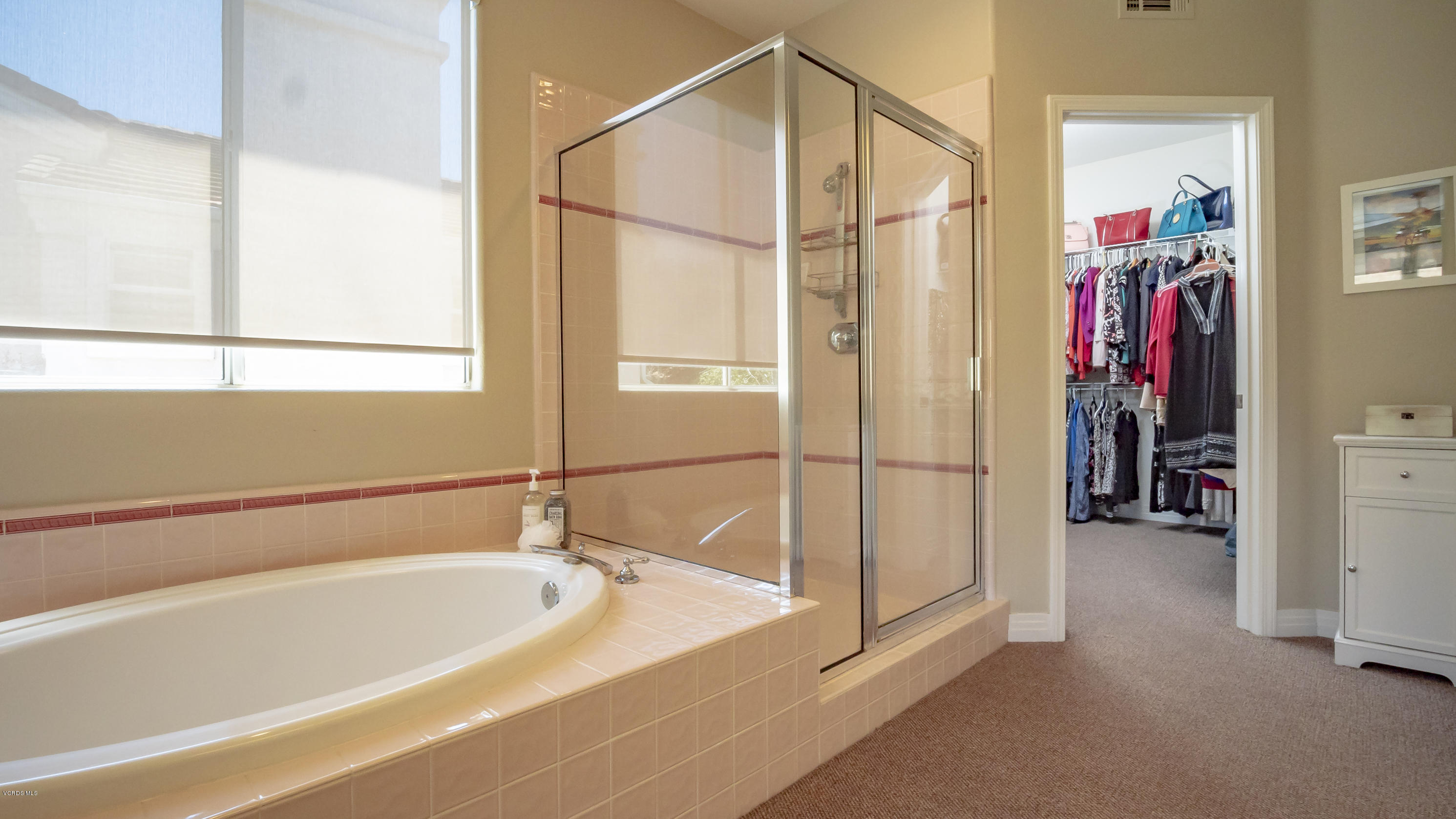 3944 Sunsetridge Road Moorpark, CA 93021 - Photo 18 of 25 a bathroom with a tub and a shower