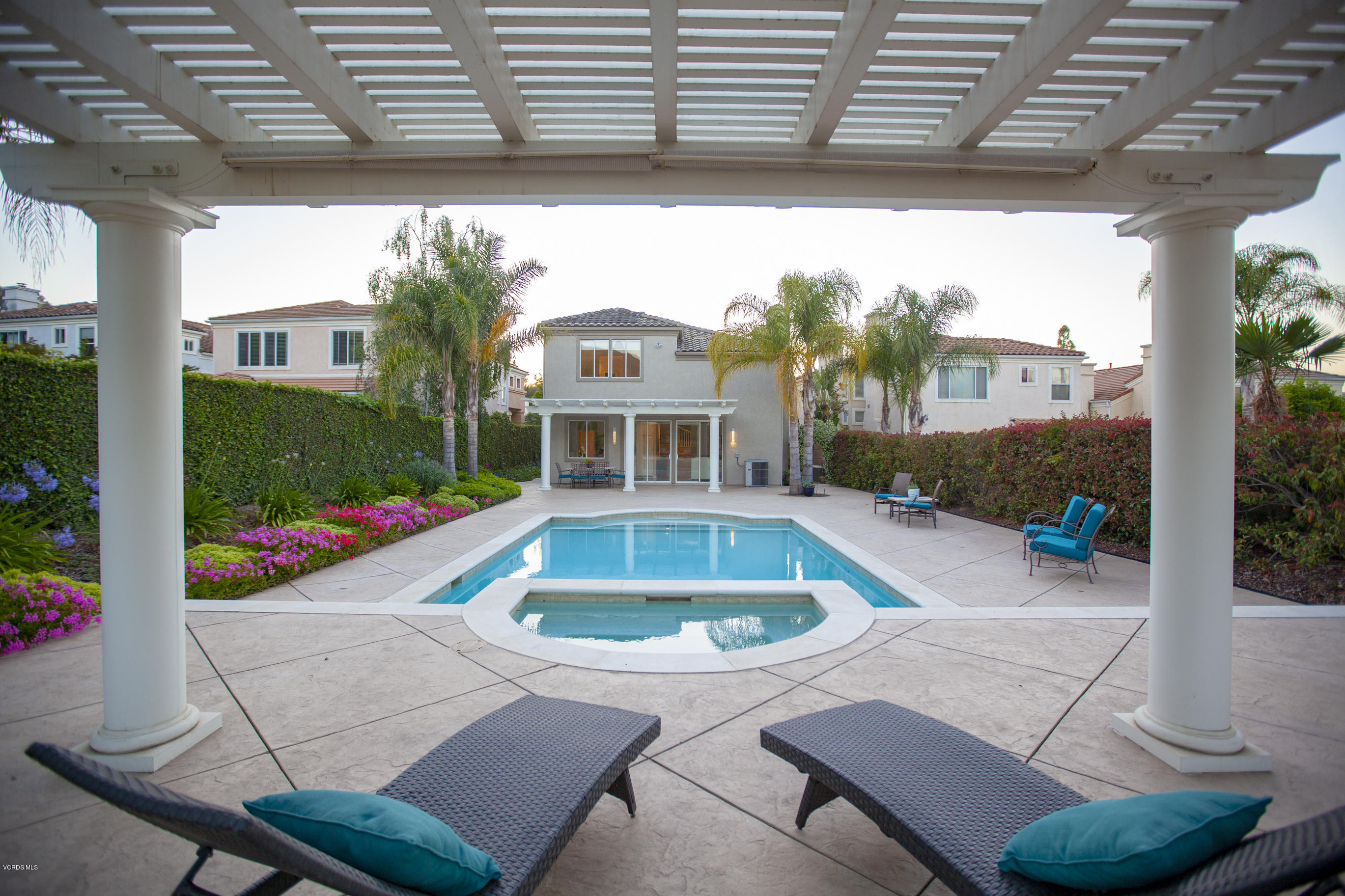 3944 Sunsetridge Road Moorpark, CA 93021 - Photo 20 of 25 a front view of a house with swimming pool