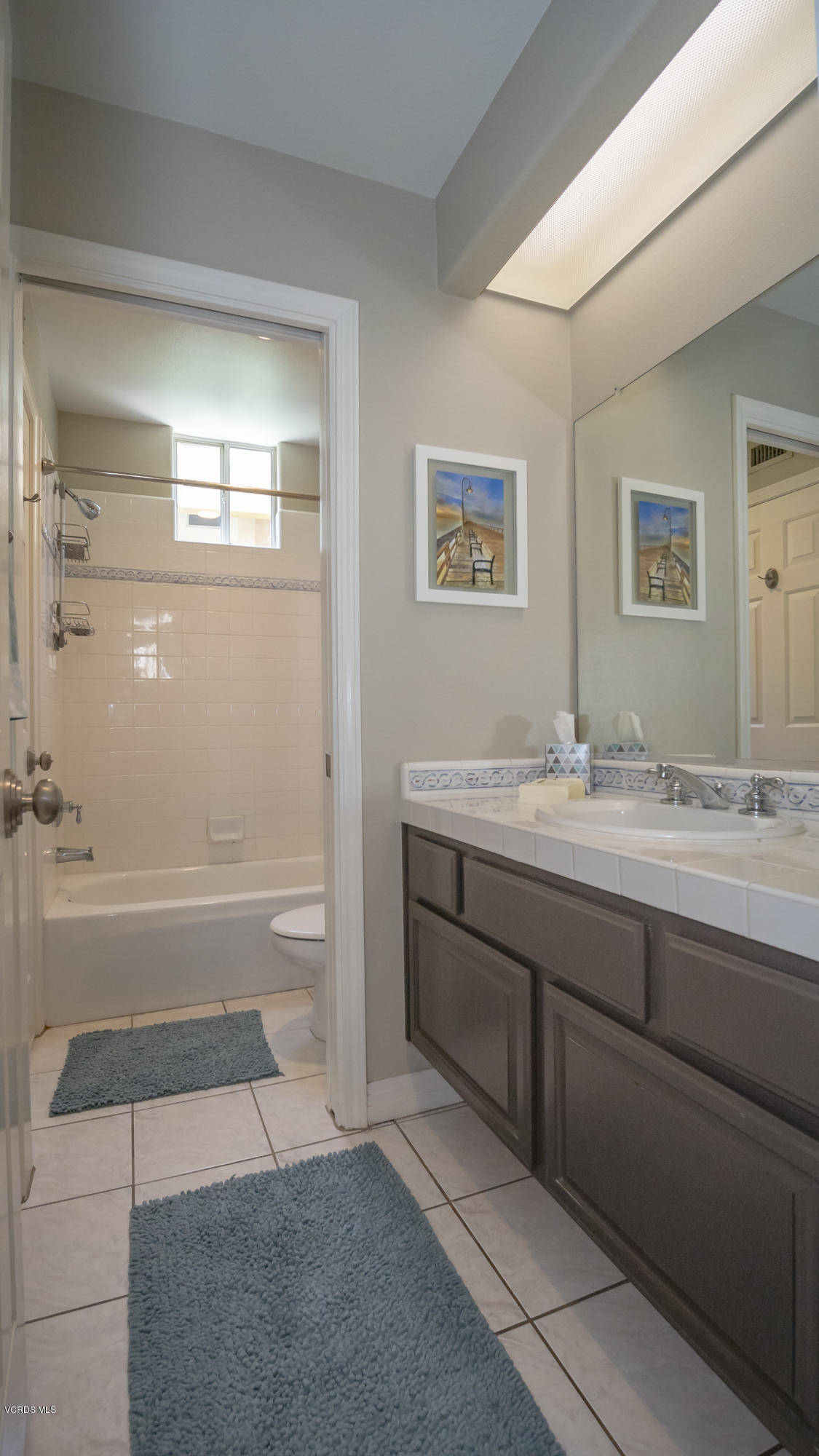 3944 Sunsetridge Road Moorpark, CA 93021 - Photo 9 of 25 a bathroom with a granite countertop sink mirror bathtub and toilet