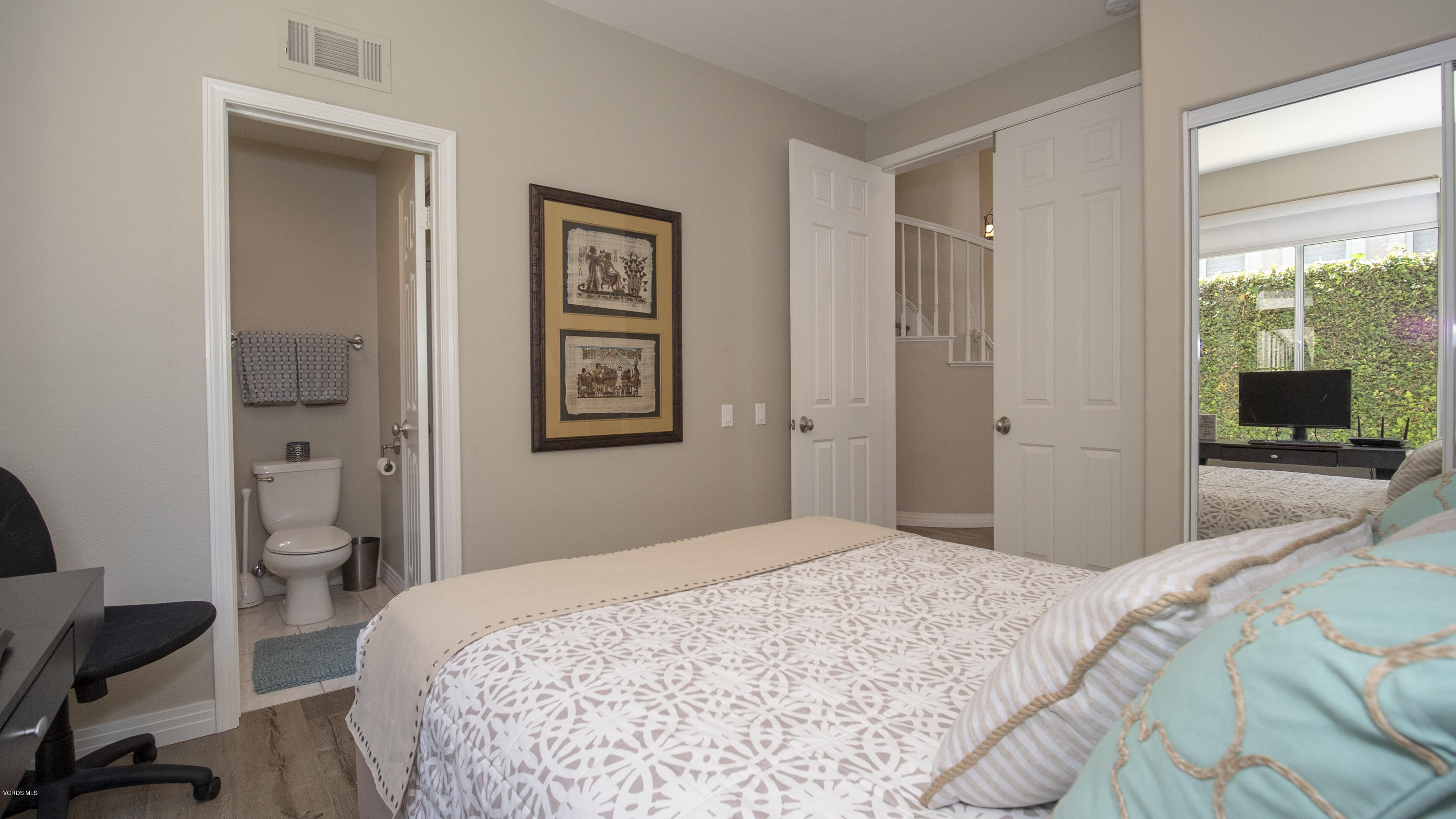 3944 Sunsetridge Road Moorpark, CA 93021 - Photo 10 of 25 a bedroom with a bed and a view of bathroom