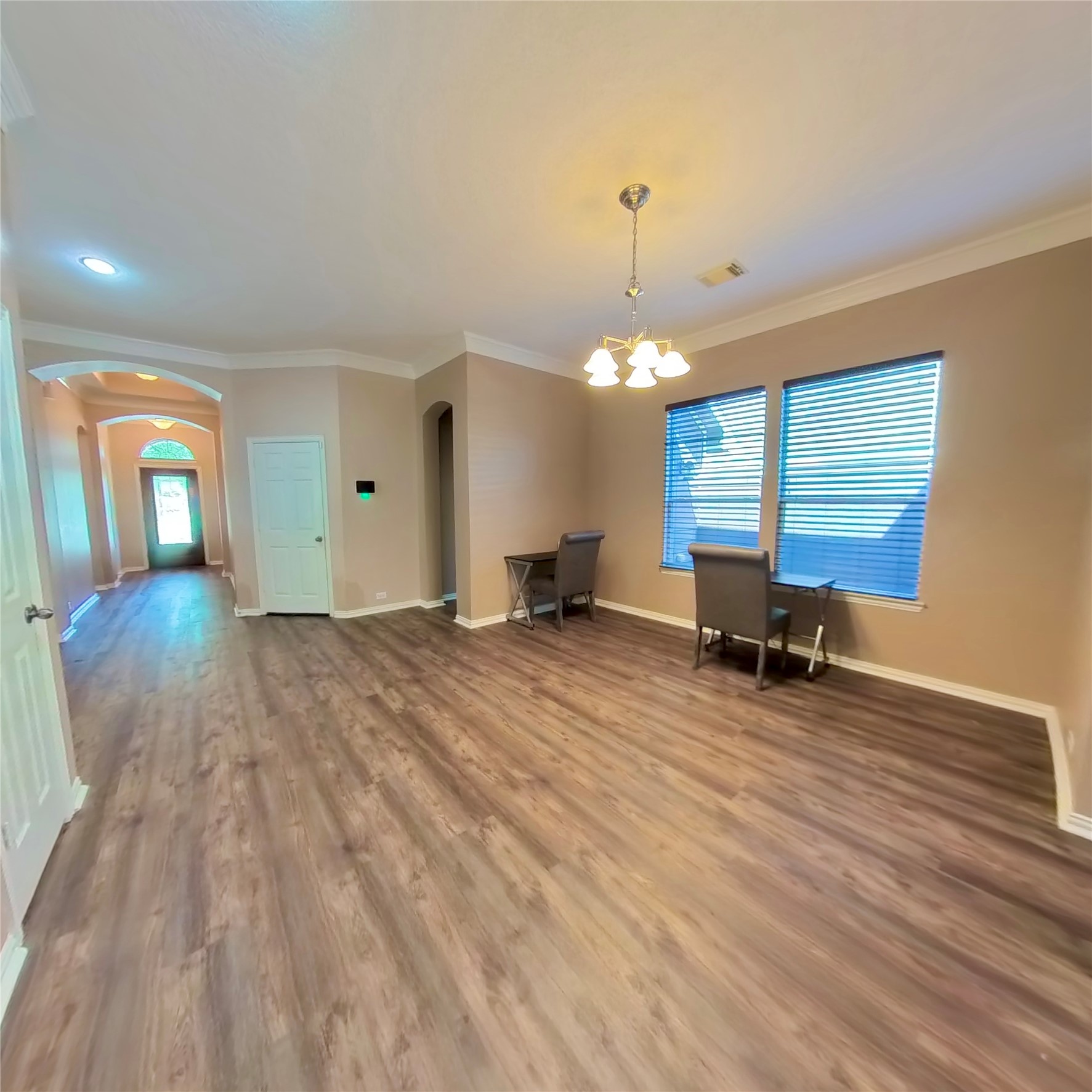 30938 Blue Ridge Park Lane Spring, TX 77386 - Photo 19 of 32 a view of a livingroom with a chair and wooden floor