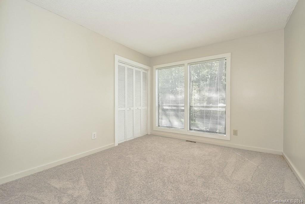 5064 Suwarrow Circle Tega Cay, SC 29708 - Photo 16 of 23 a view of an empty room with a window