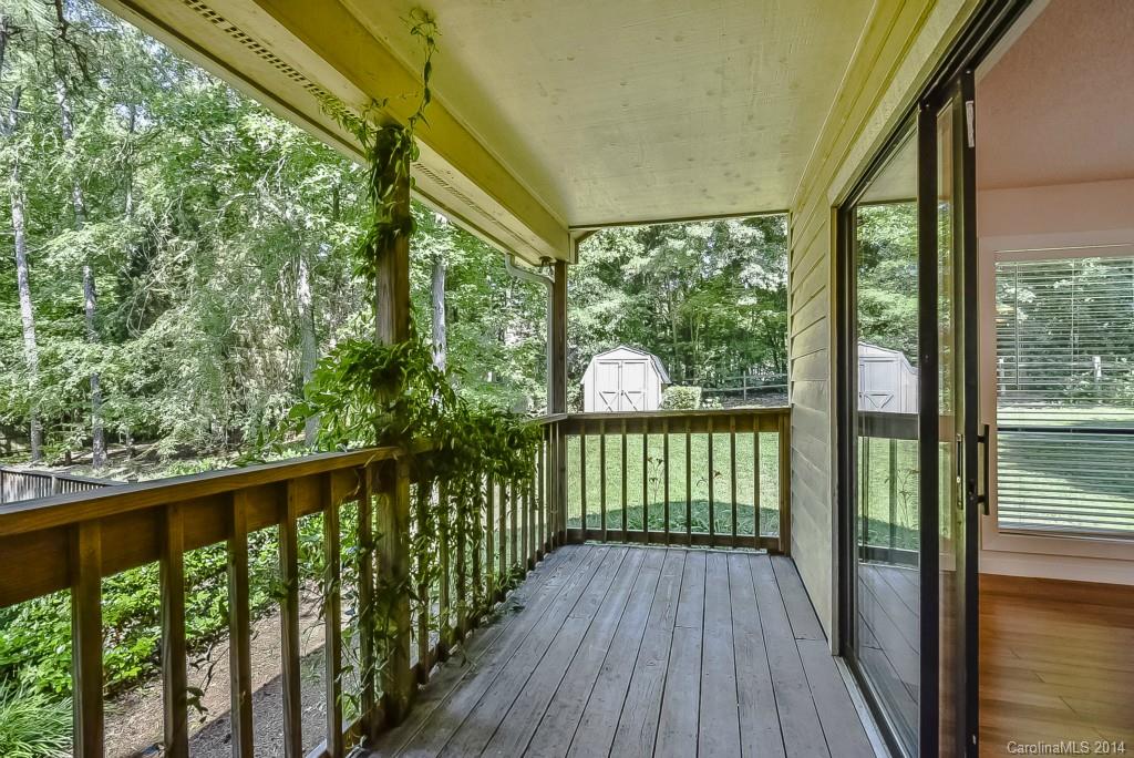 5064 Suwarrow Circle Tega Cay, SC 29708 - Photo 18 of 23 a view of a wooden deck