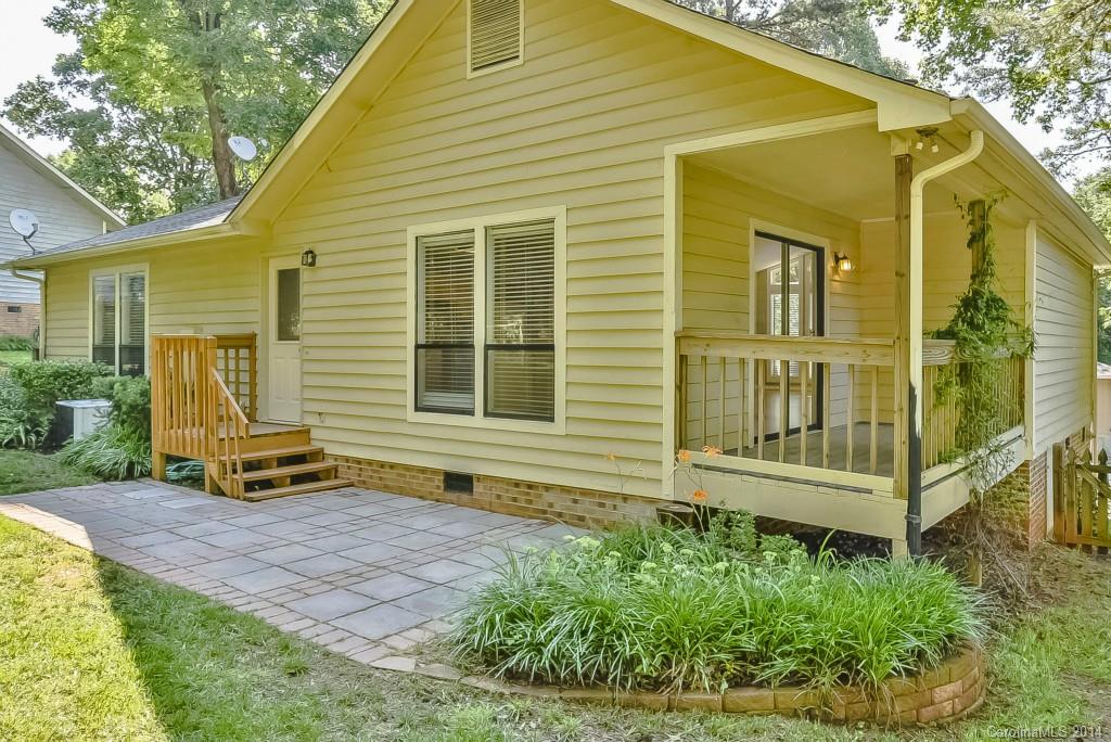 5064 Suwarrow Circle Tega Cay, SC 29708 - Photo 19 of 23 a view of a house with backyard and sitting area