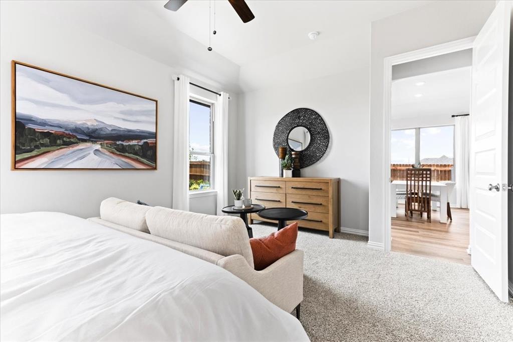 2339 Butler Avenue Fate, TX 75087 - Photo 14 of 35 a bedroom with furniture and a large window