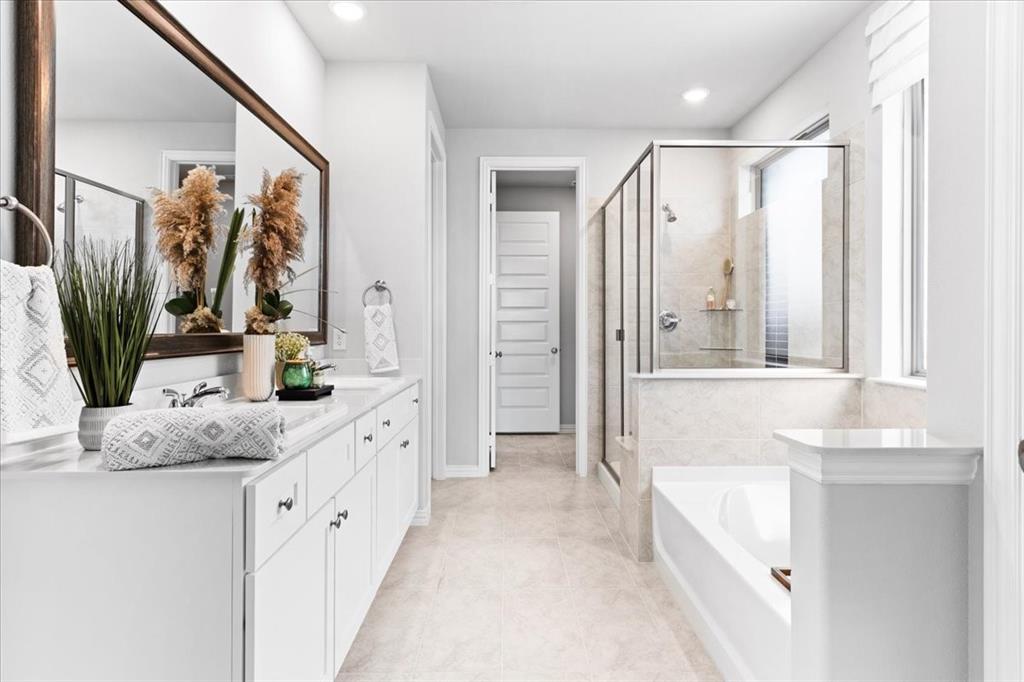 2339 Butler Avenue Fate, TX 75087 - Photo 15 of 35 a bathroom with a granite countertop sink mirror and double