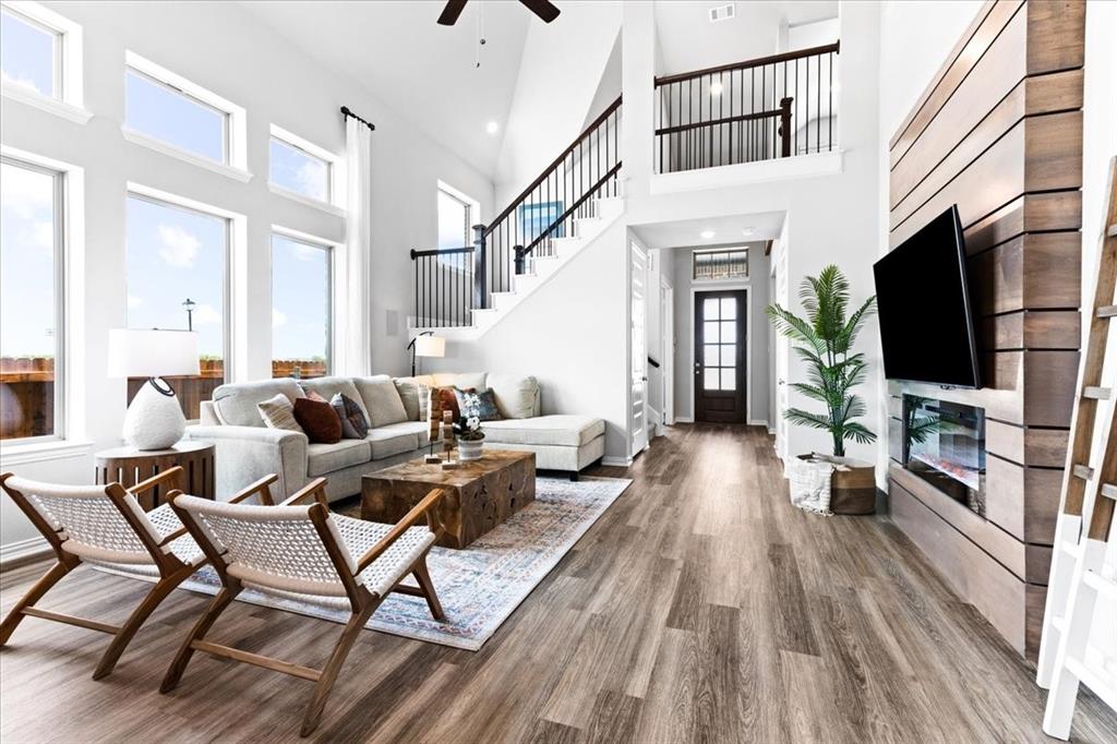 2339 Butler Avenue Fate, TX 75087 - Photo 5 of 35 a living room with furniture and a flat screen tv