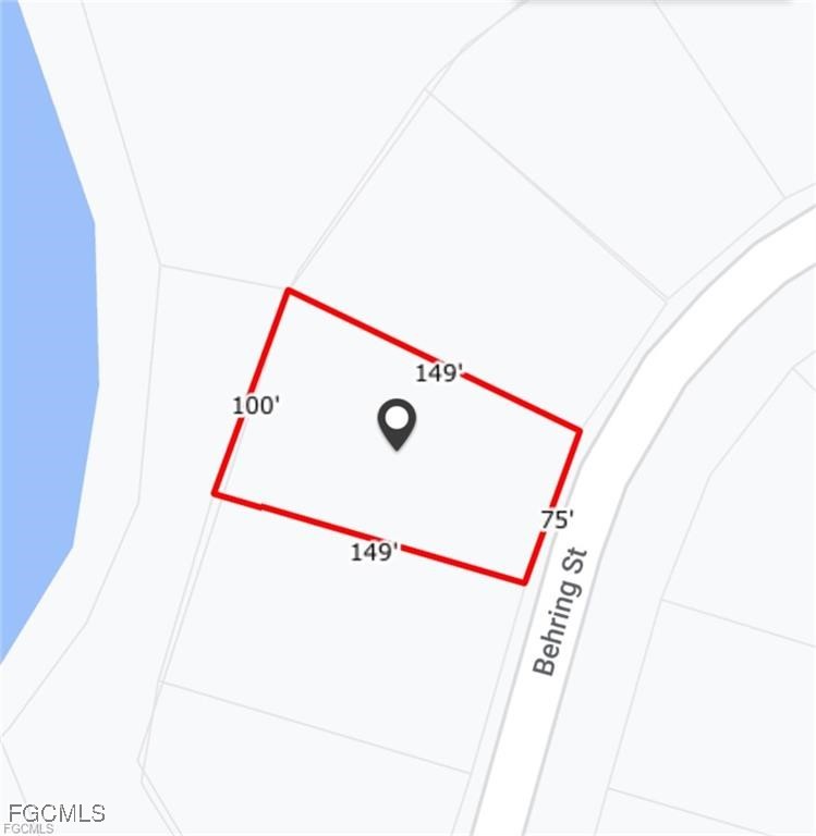 423 Behring Street Lehigh Acres, FL 33974 - Photo 2 of 3 a utility room with dryer and washer