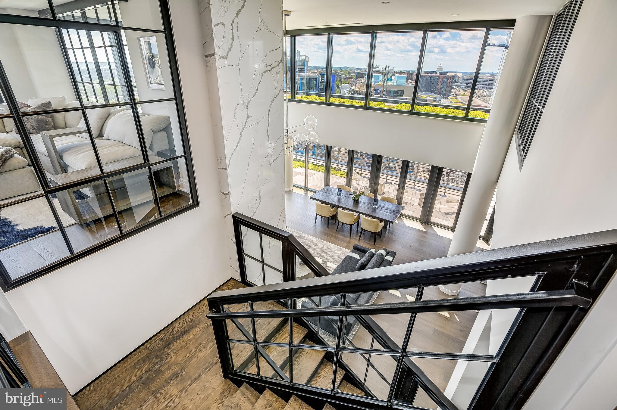 320-3 Florida Avenue Northeast, Unit PH3 Washington, DC 20002 - Photo 27 of 46 Reclaimed Warehouse Glass & Steel Staircase