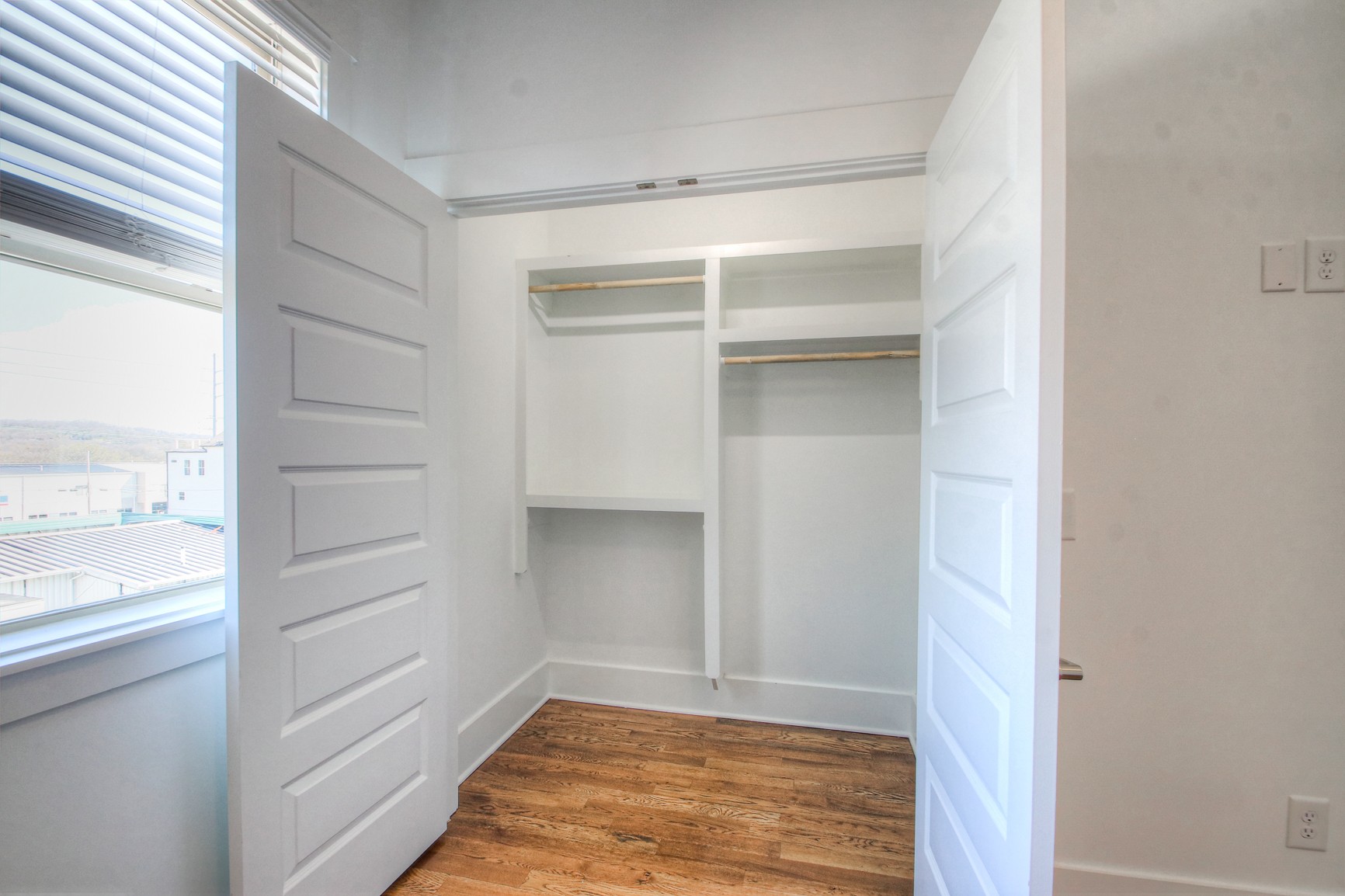 341 Edwin Street, Unit A Nashville, TN 37207 - Photo 26 of 37 a view of walk in closet with empty racks
