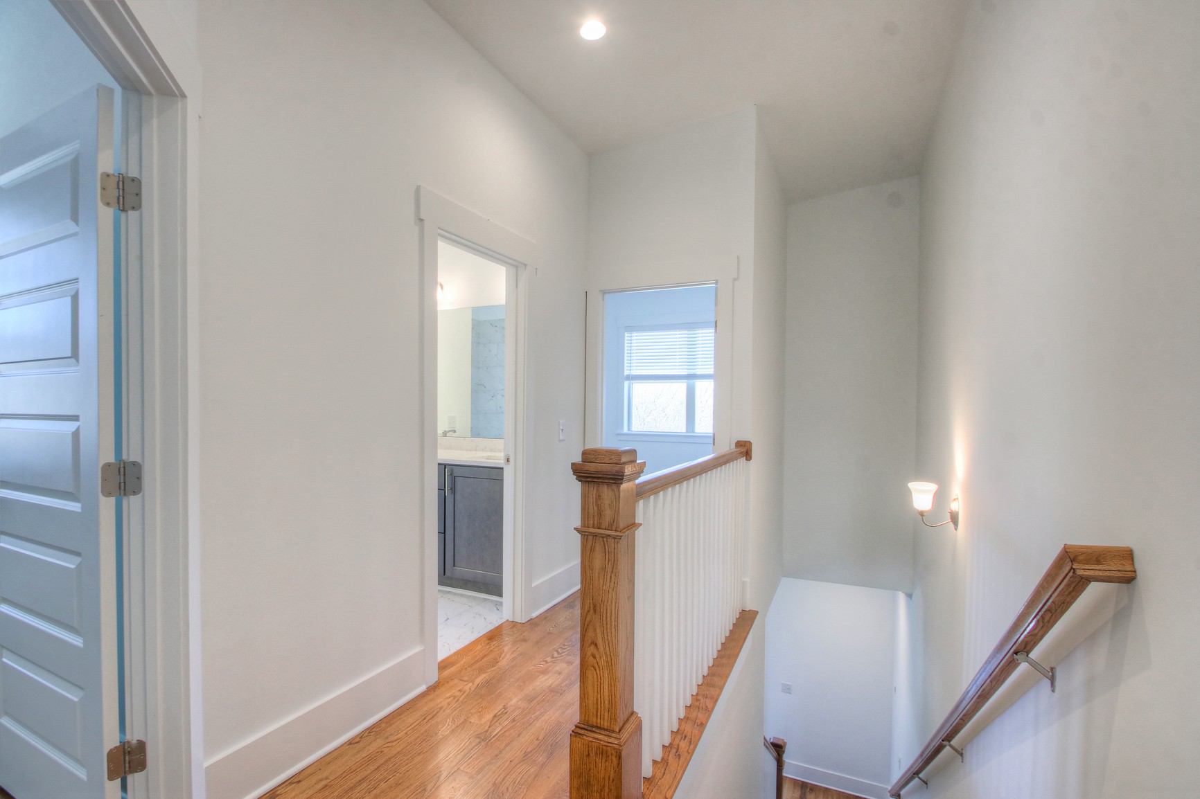 341 Edwin Street, Unit A Nashville, TN 37207 - Photo 27 of 37 a view of a hallway with windows and stairs