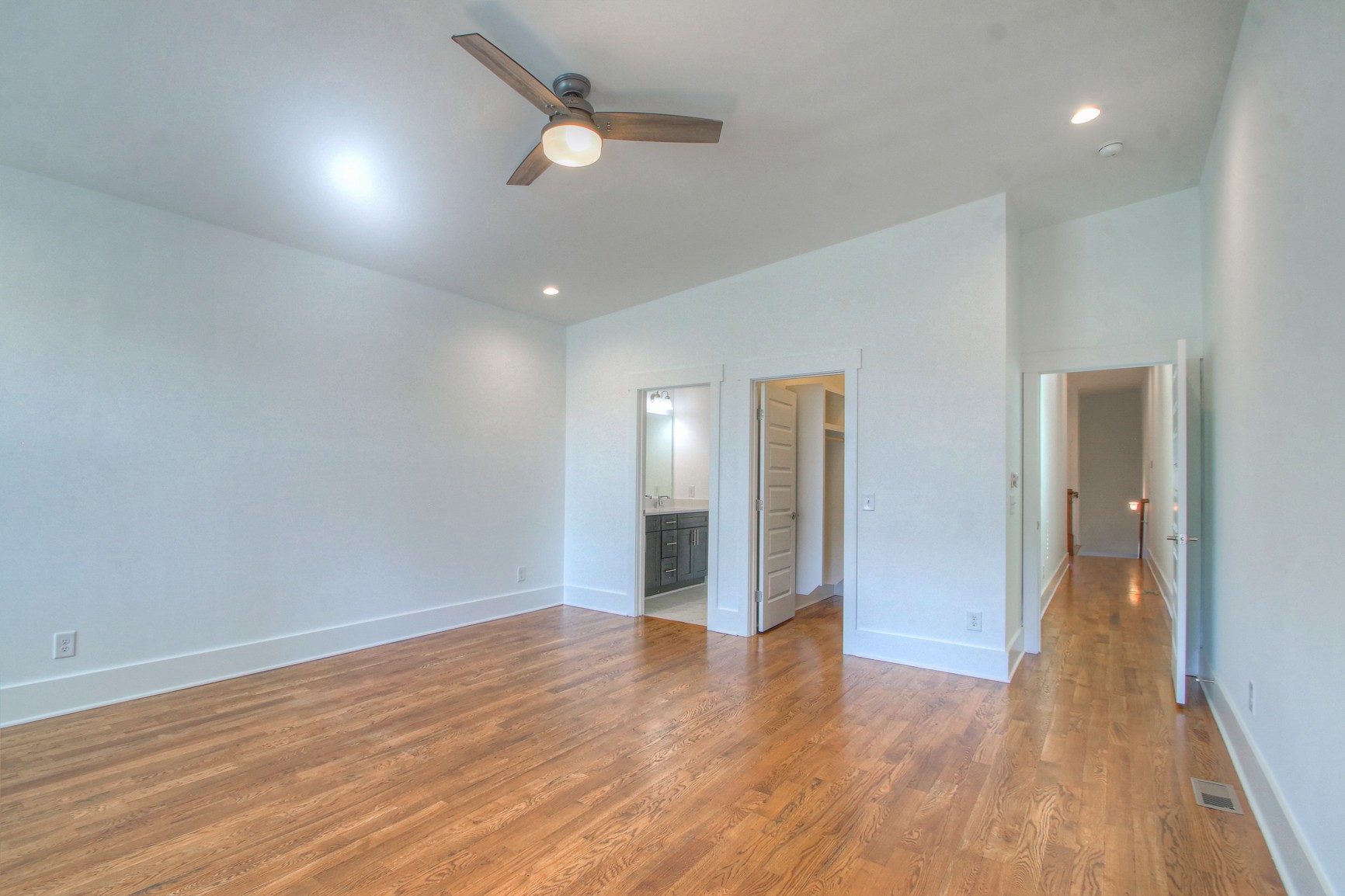 341 Edwin Street, Unit A Nashville, TN 37207 - Photo 29 of 37 a view of an empty room with wooden floor
