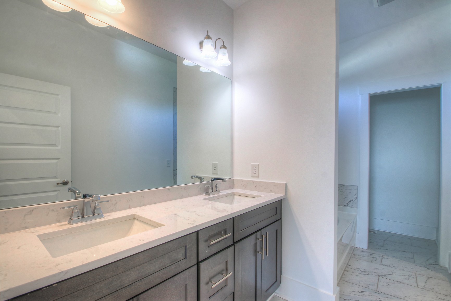 341 Edwin Street, Unit A Nashville, TN 37207 - Photo 32 of 37 a bathroom with a sink and a mirror