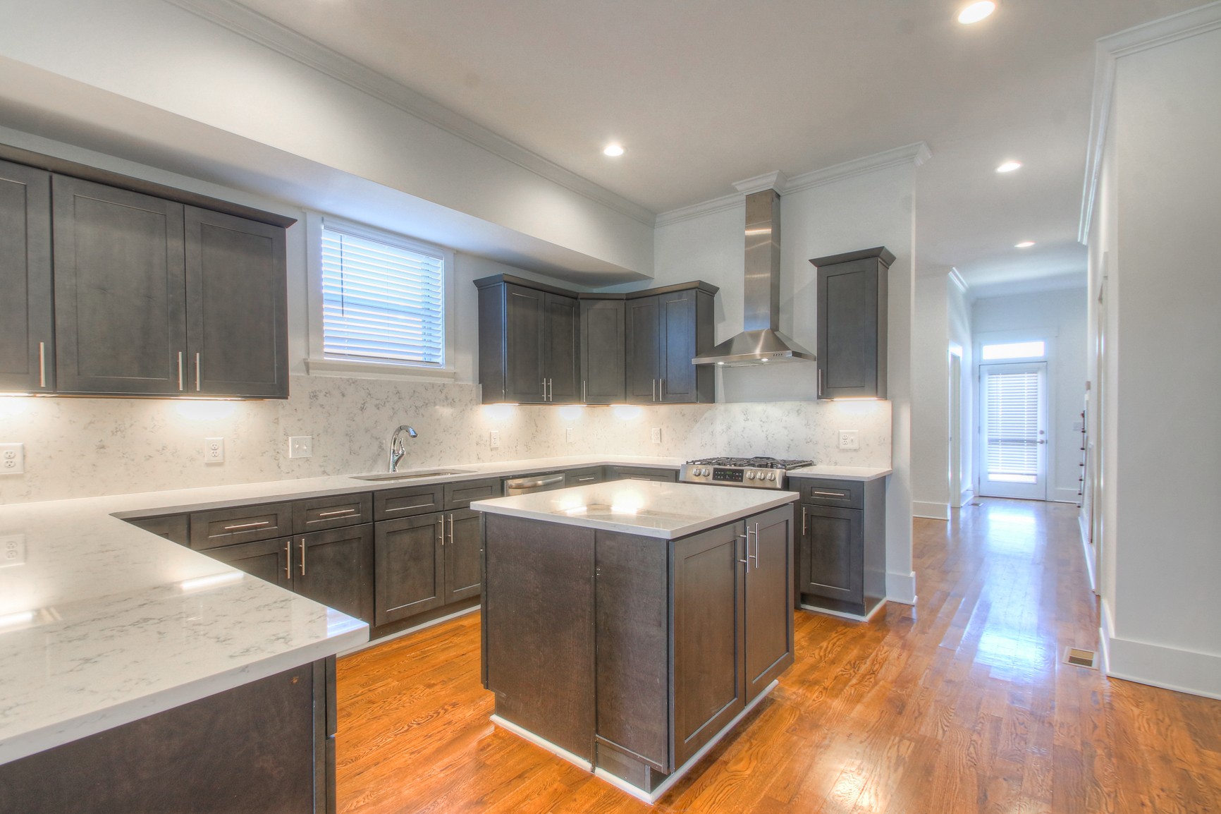 341 Edwin Street, Unit A Nashville, TN 37207 - Photo 9 of 37 a kitchen with stainless steel appliances granite countertop a sink stove and refrigerator