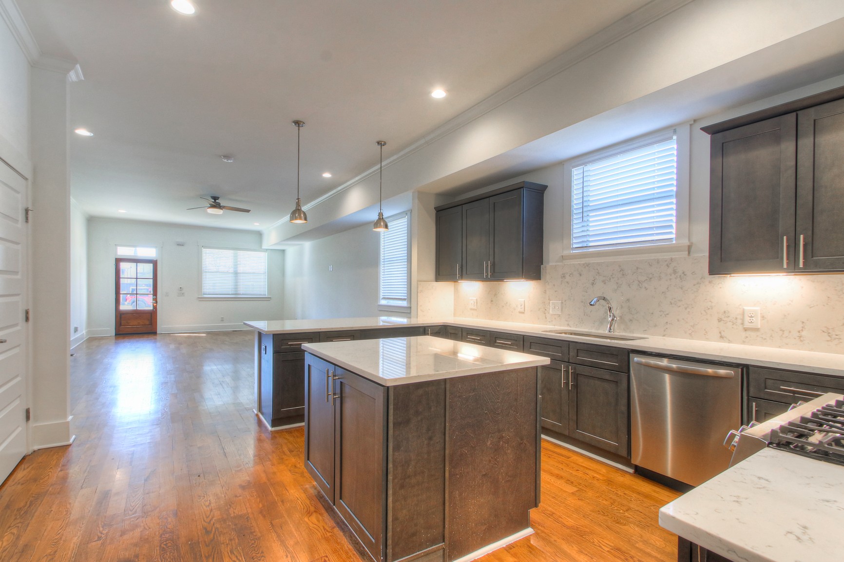 341 Edwin Street, Unit A Nashville, TN 37207 - Photo 10 of 37 a kitchen with granite countertop a sink counter top space and cabinets