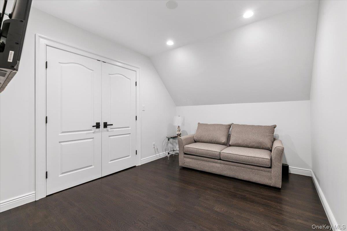 19 West Tiana Road Hampton Bays, NY 11946 - Photo 44 of 50 a living room with furniture and white walls