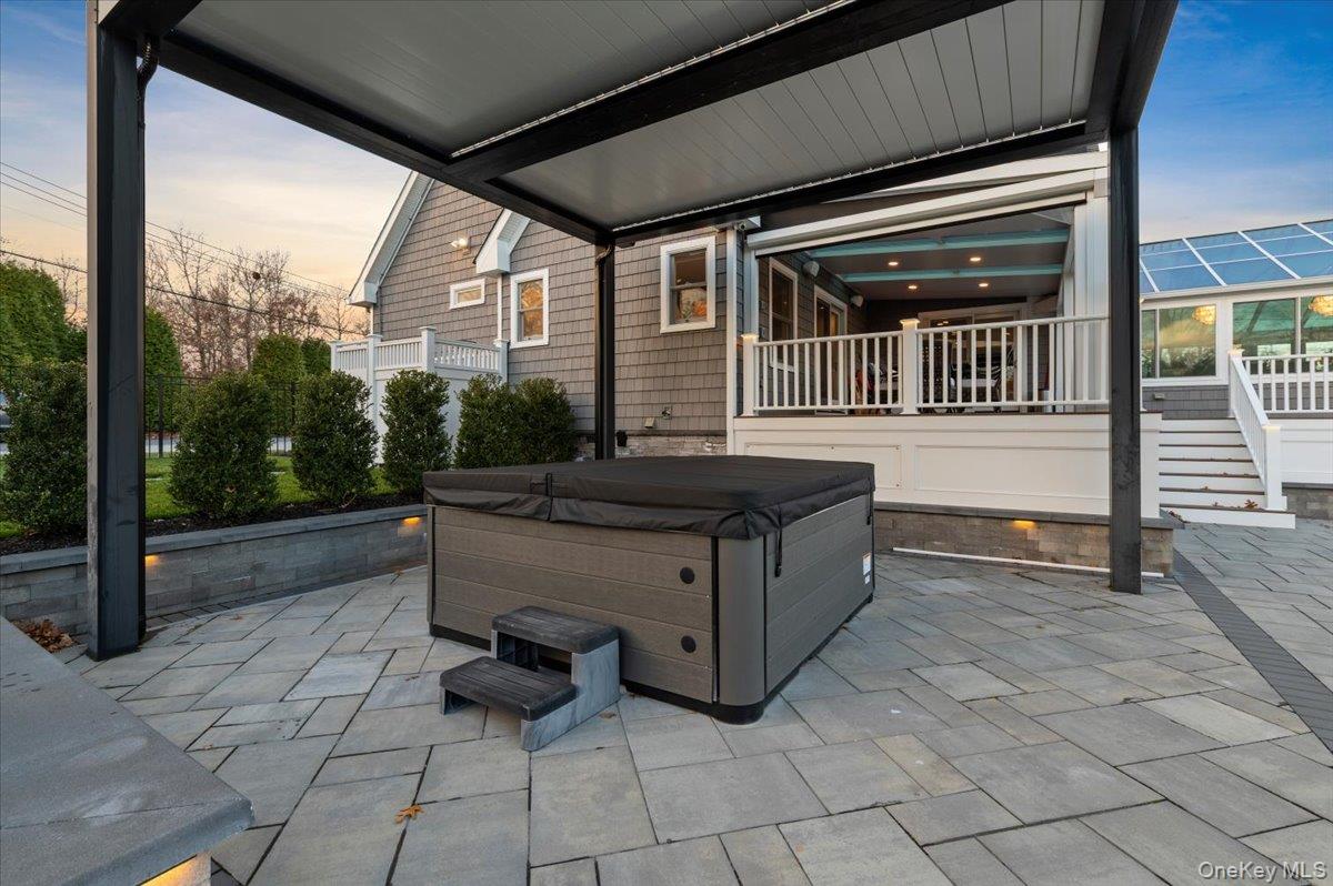 19 West Tiana Road Hampton Bays, NY 11946 - Photo 46 of 50 a view of a porch with furniture