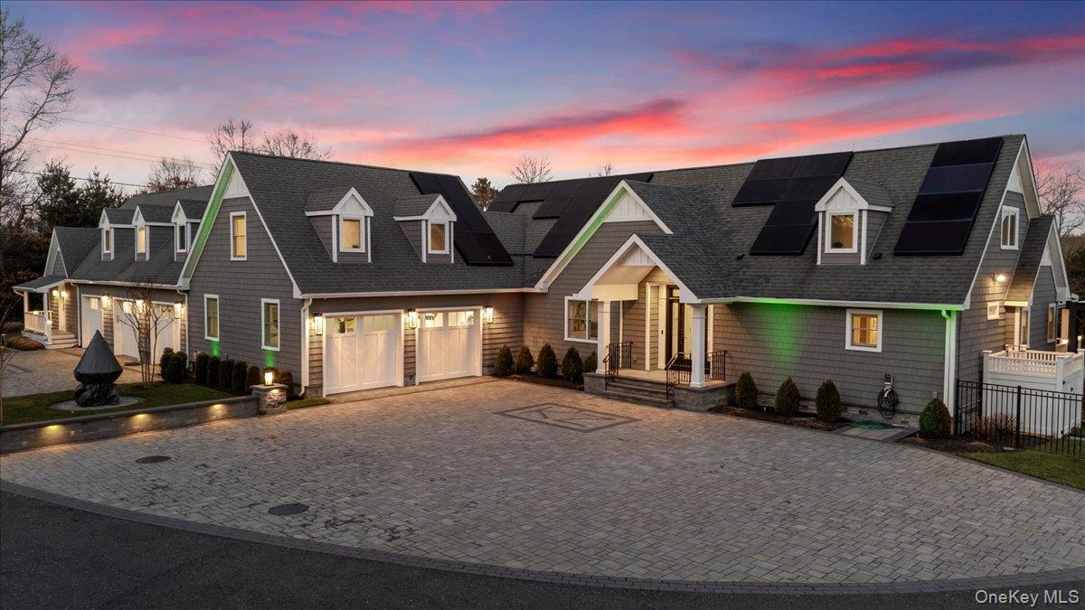 19 West Tiana Road Hampton Bays, NY 11946 - Photo 50 of 50 a front view of a house with a yard