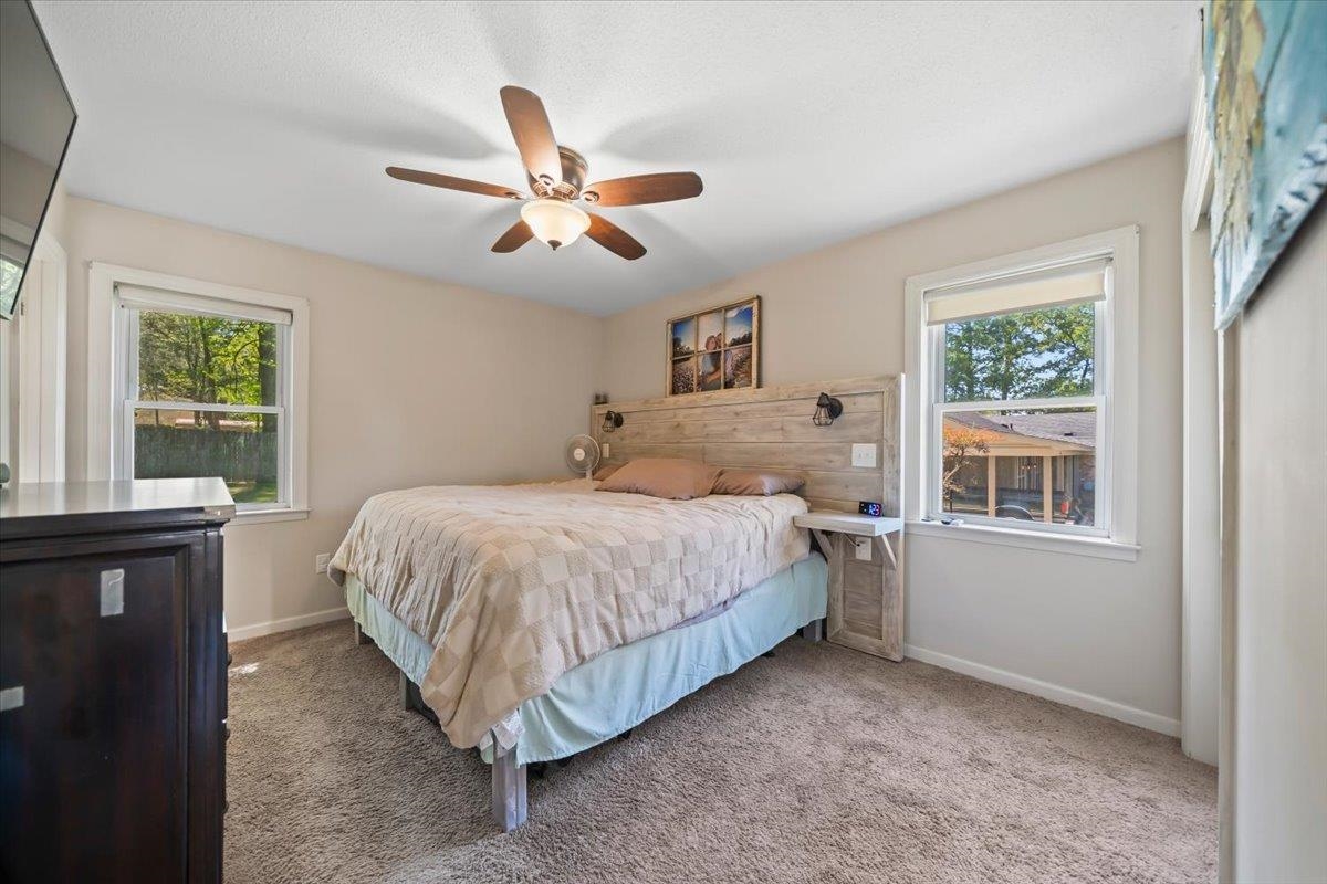 6315 Bardstown Road Bartlett, TN 38134 - Photo 18 of 31 Carpeted bedroom featuring baseboards and ceiling fan