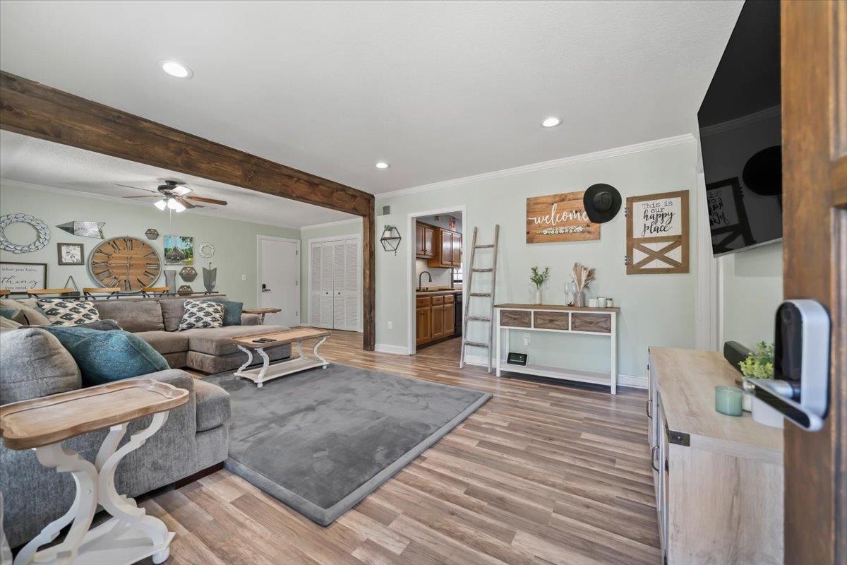 6315 Bardstown Road Bartlett, TN 38134 - Photo 7 of 31 Living area featuring ornamental molding, light wood-style floors, recessed lighting, and ceiling fan