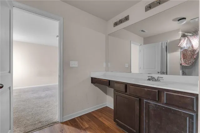 a view of a sink and mirror