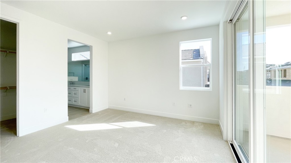 191 Junco Irvine, CA 92618 - Photo 18 of 31 an empty room with windows and entrance