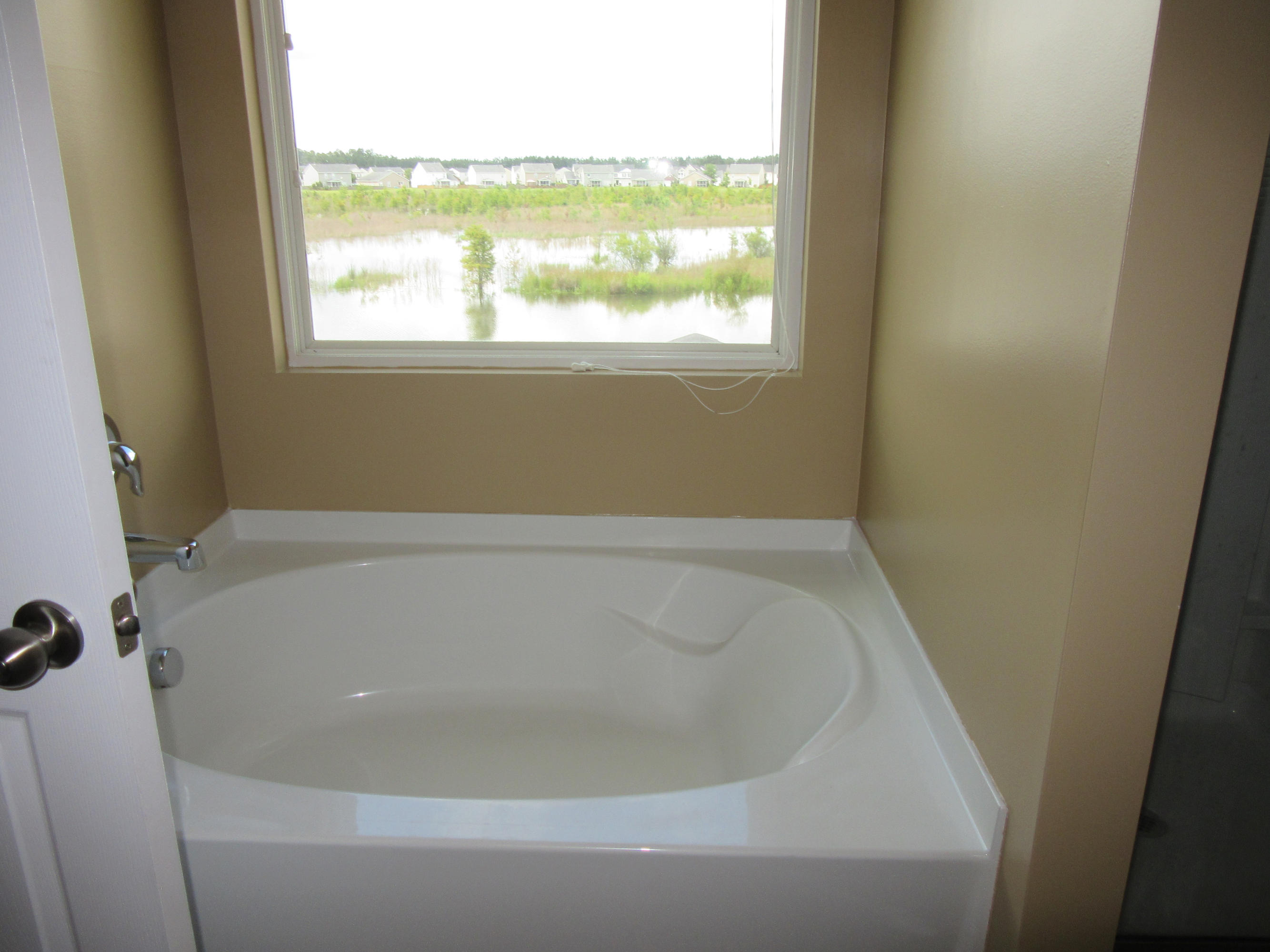 360 Deep River Road Summerville, SC 29486 - Photo 25 of 45 Master bathroom w/tub and pond view