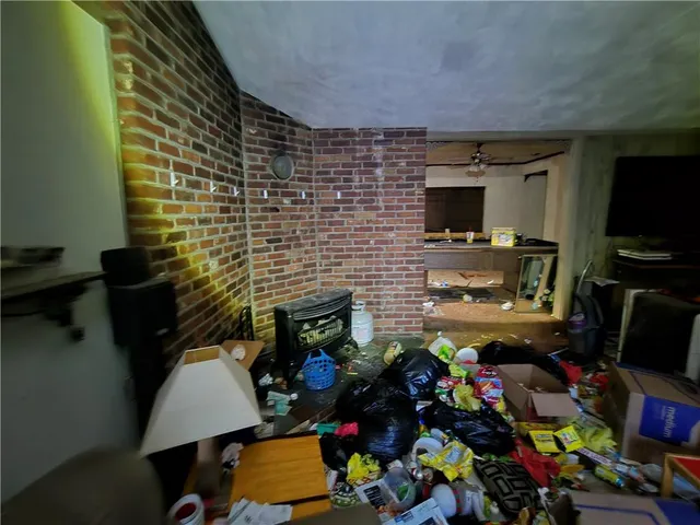 a room with furniture and a flat screen tv