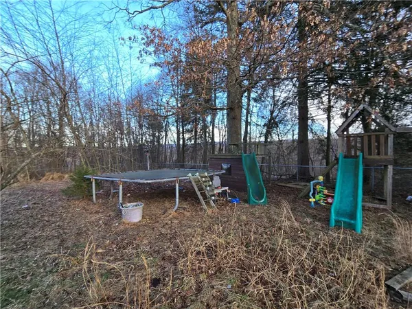 a view of a park with furniture