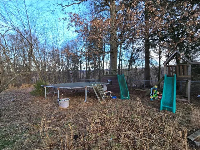 a view of a park with furniture