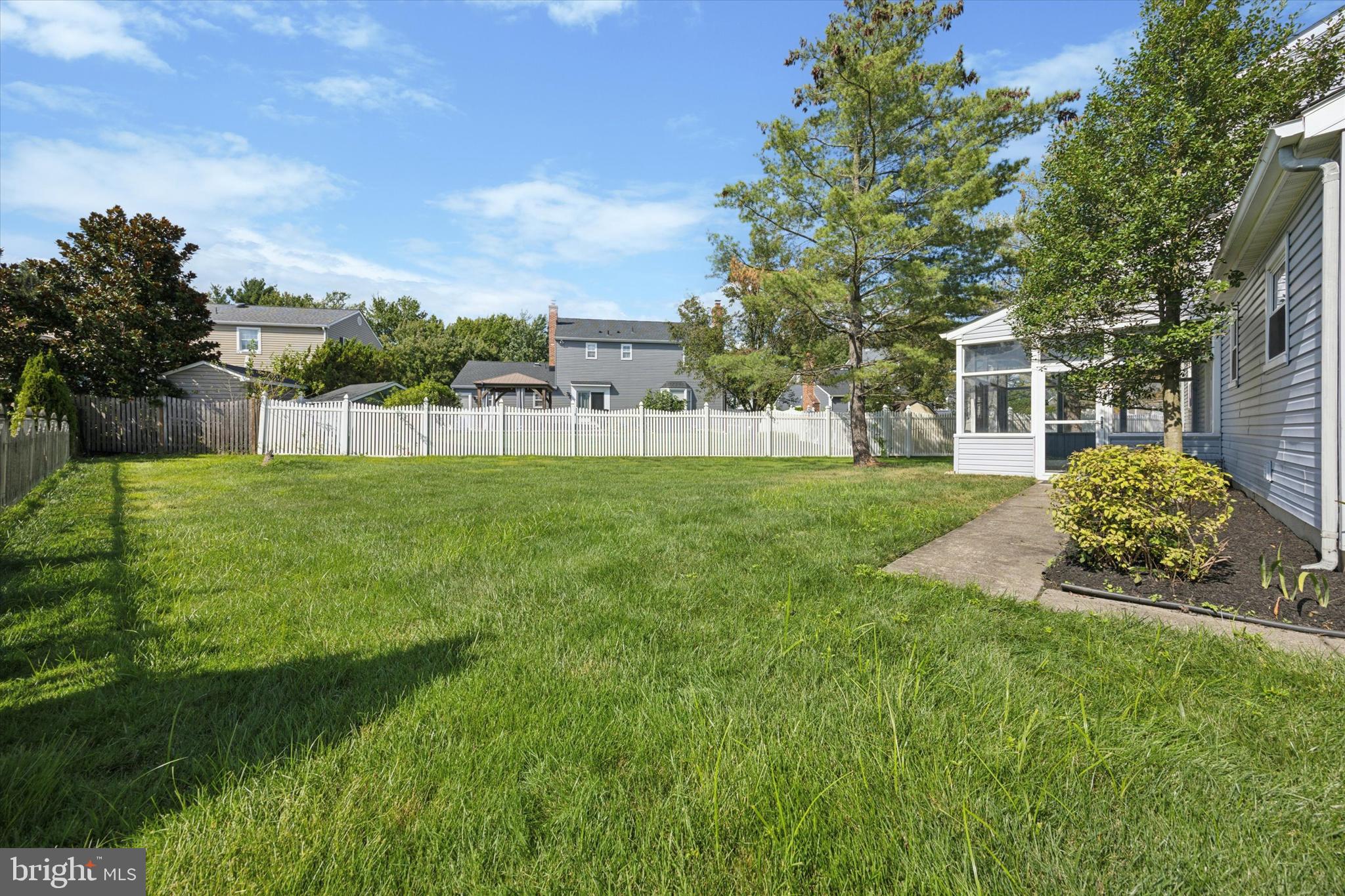 9 Nottingham Road Marlton, NJ 08053 - Photo 34 of 35 a view of a backyard with sitting area
