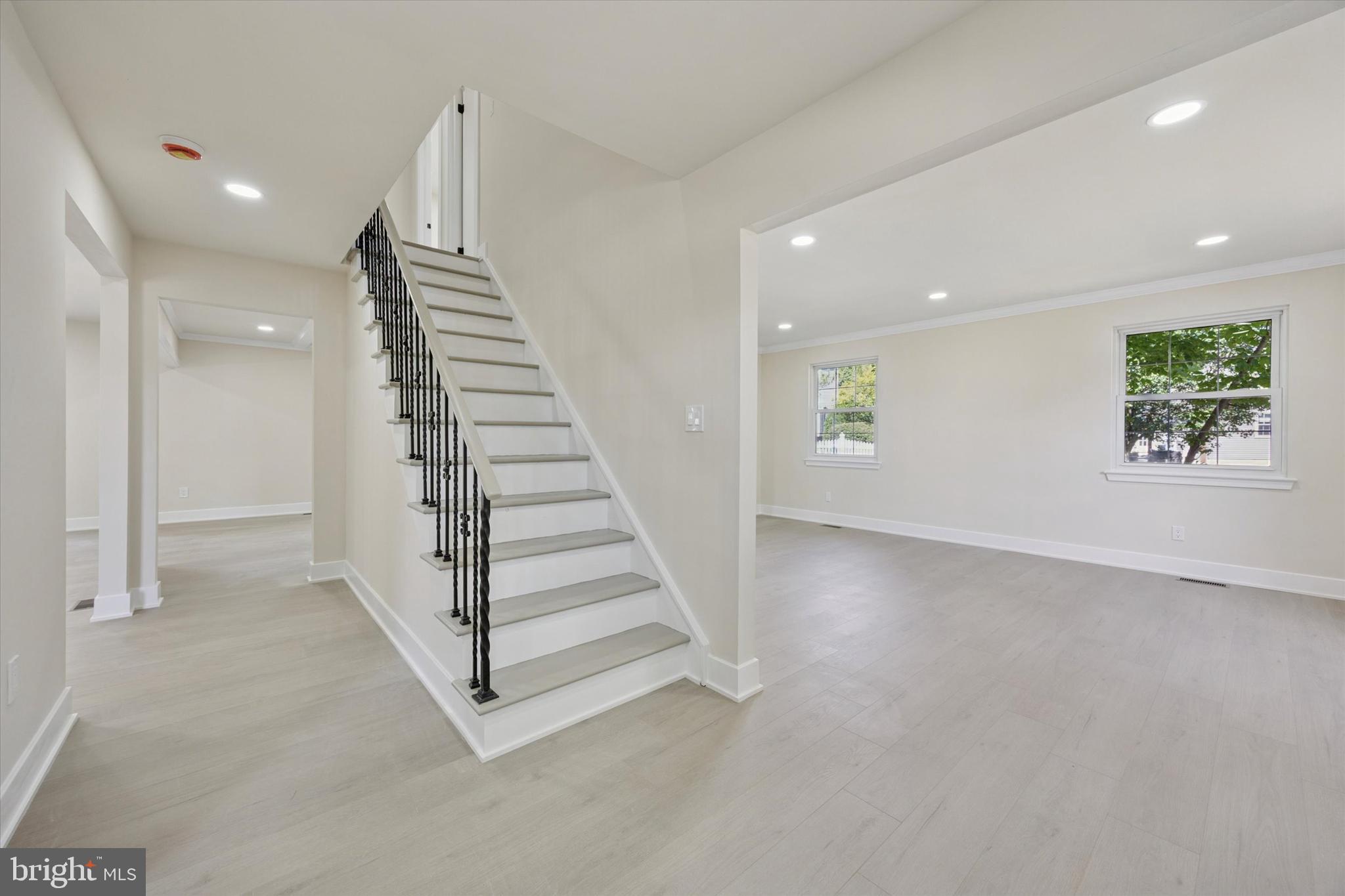 9 Nottingham Road Marlton, NJ 08053 - Photo 5 of 35 an entryway in a hall with a window