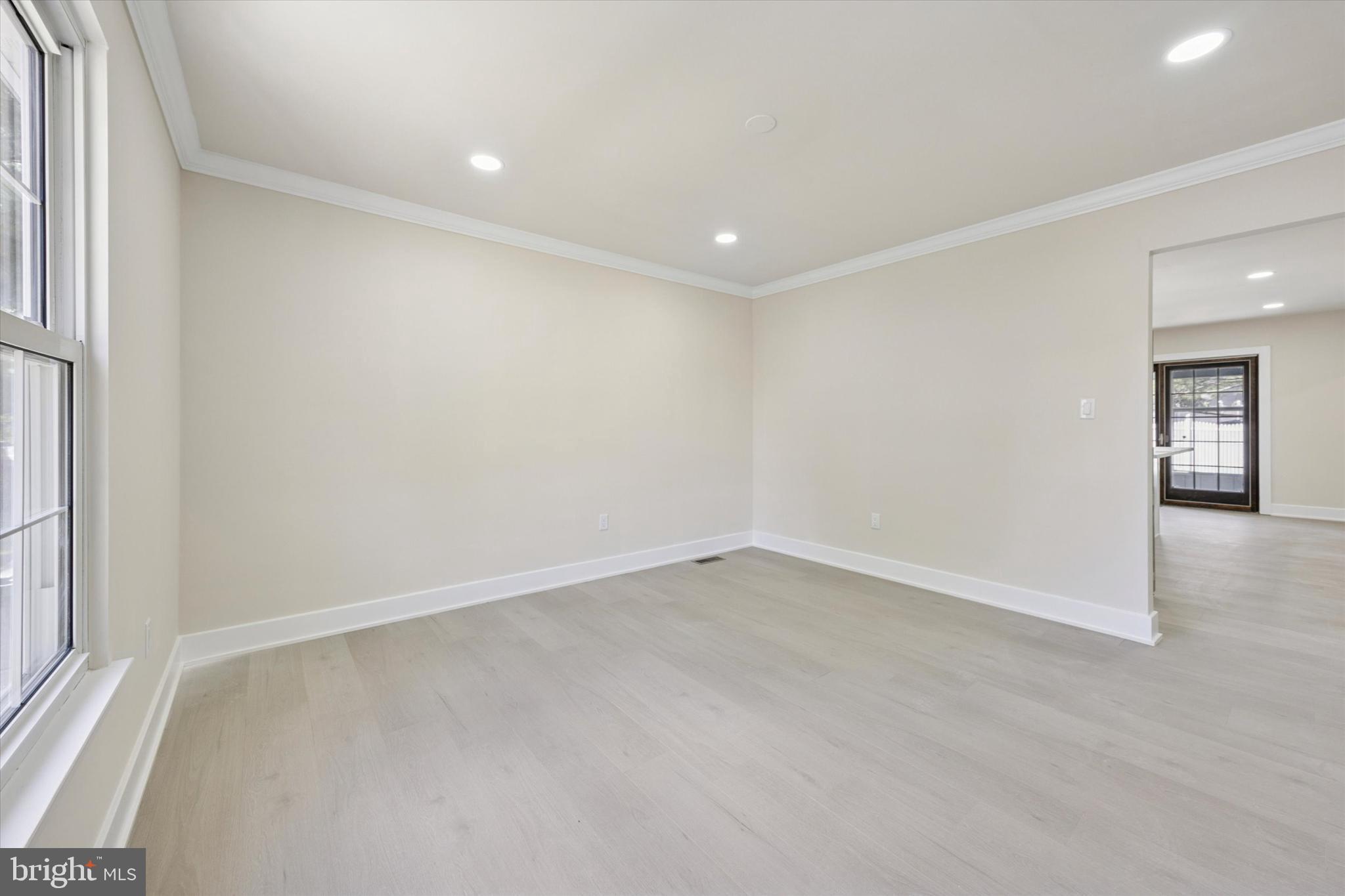 9 Nottingham Road Marlton, NJ 08053 - Photo 6 of 35 an empty room with entrance and windows