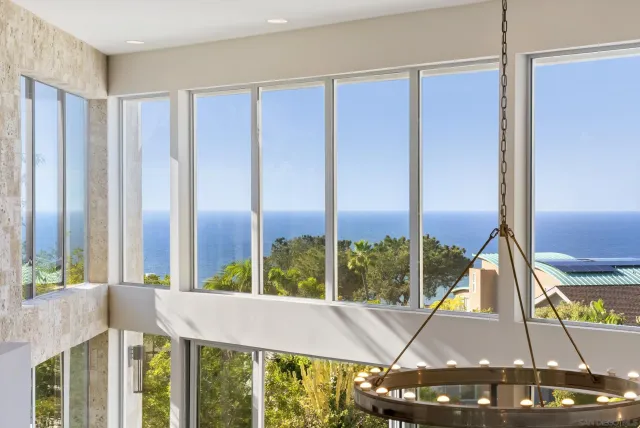 a view of a balcony with chairs