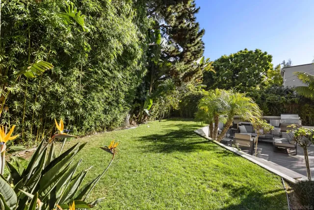 a view of a backyard with a patio