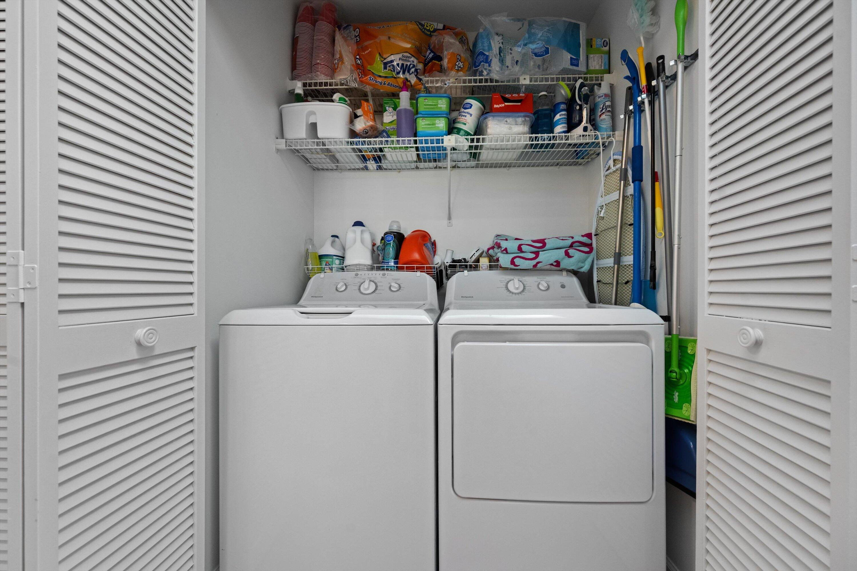 2 Ridge Pointe Drive, Unit A Boynton Beach, FL 33435 - Photo 20 of 24 a utility room with dryer and washer