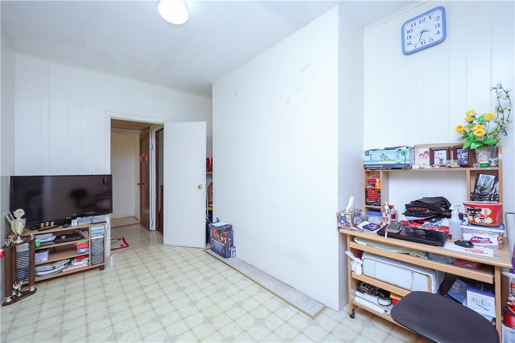 1216 Tabor Court Brooklyn, NY 11219 - Photo 7 of 20 a room with toys and a flat screen tv